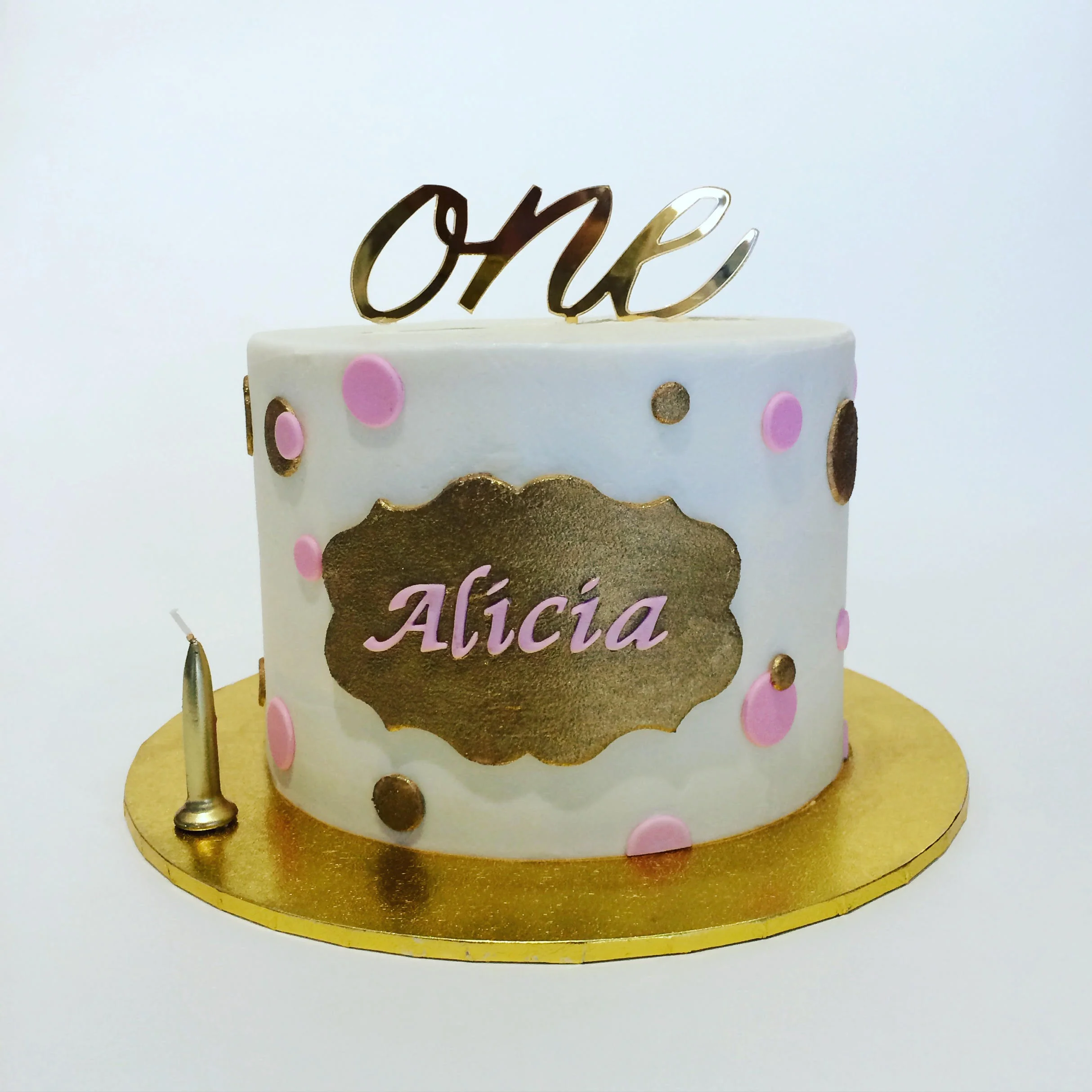 Alicia's first birthday cake.jpg
