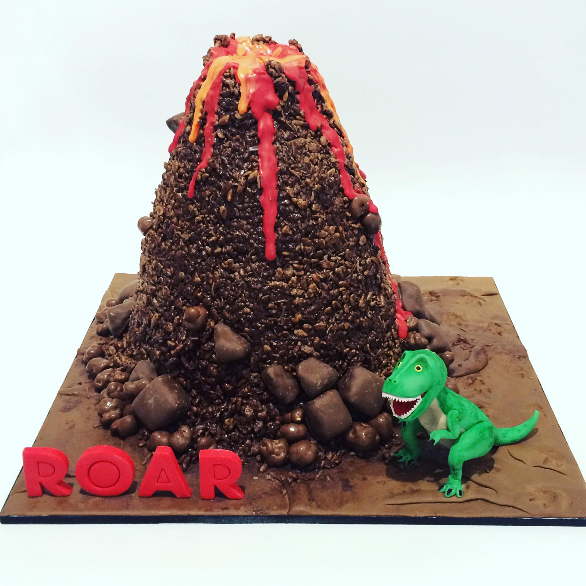 Chocolate Rose Bakeshop - Dinosaur and volcano cake! | Facebook