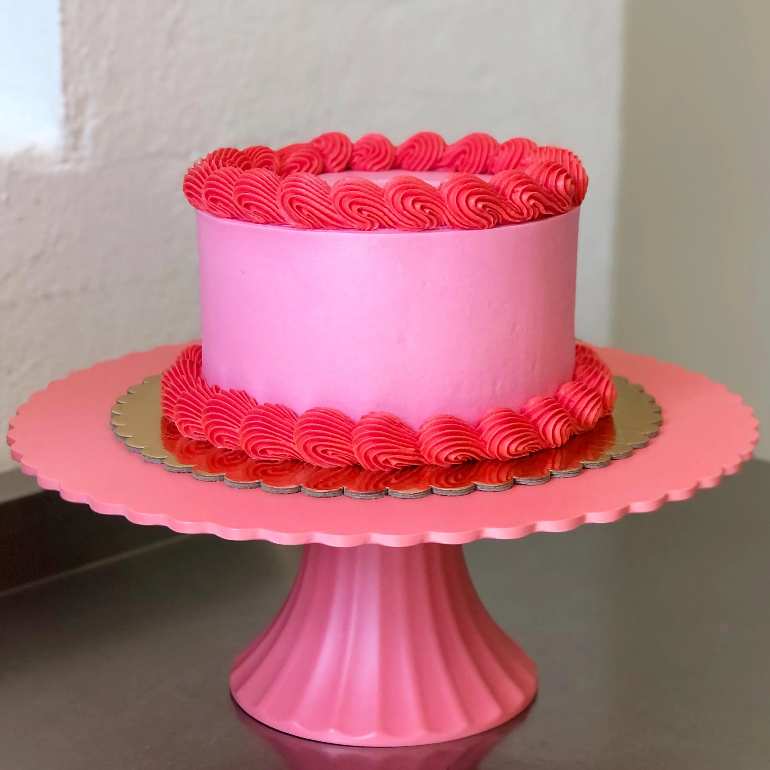 Fully-Iced-Custom-Colour-Buttercream-Cake-with-Piping-Fuchsia-Pink-And-Red.jpg