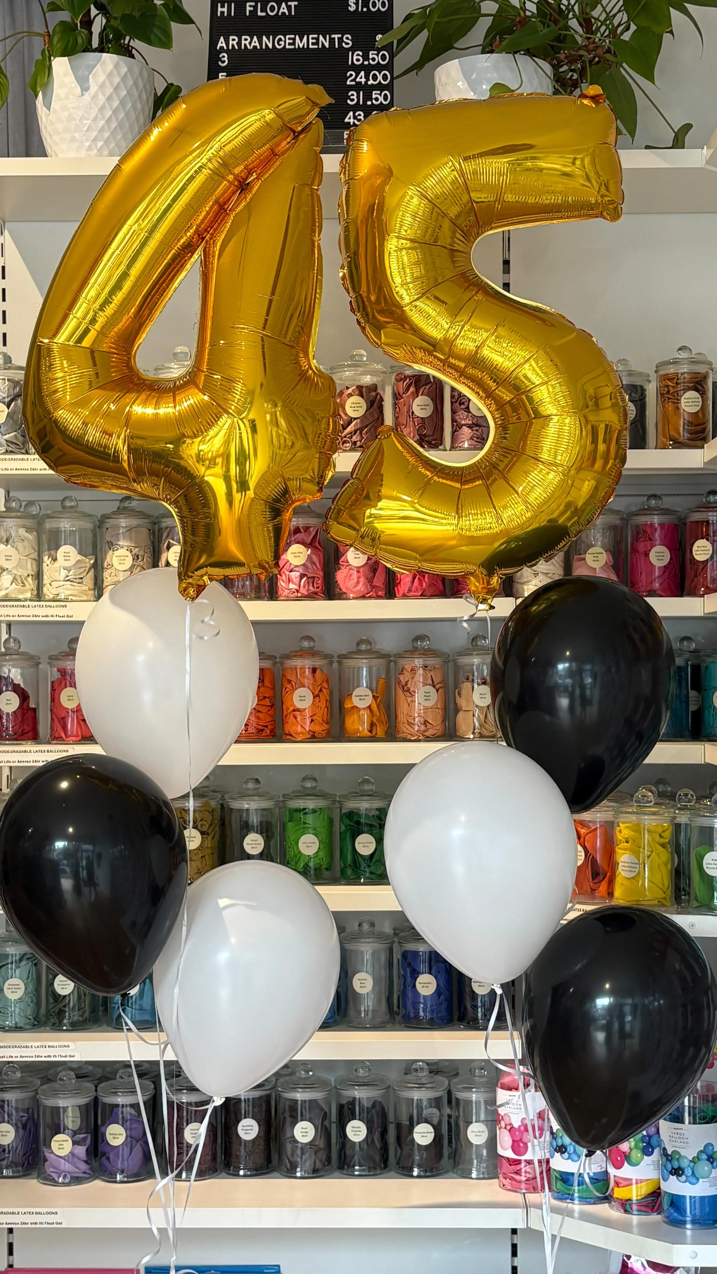 Medium foil number and black and white latex balloon arrangements for James today! Pop by and let us help you plan your next celebration. 🎈#burntbutterballoons