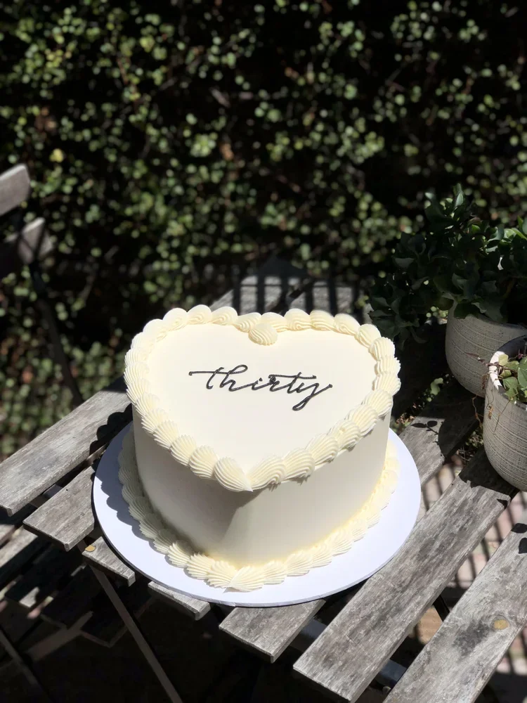 Simple-Heart-Shaped-Buttercream-Cake.webp