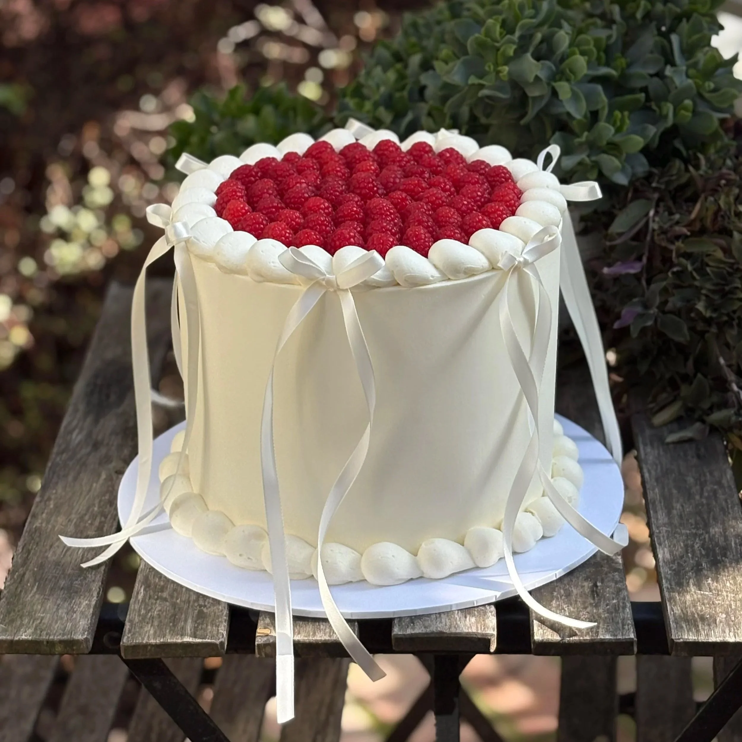 Tall Fresh Raspberry Round Shaped Cake