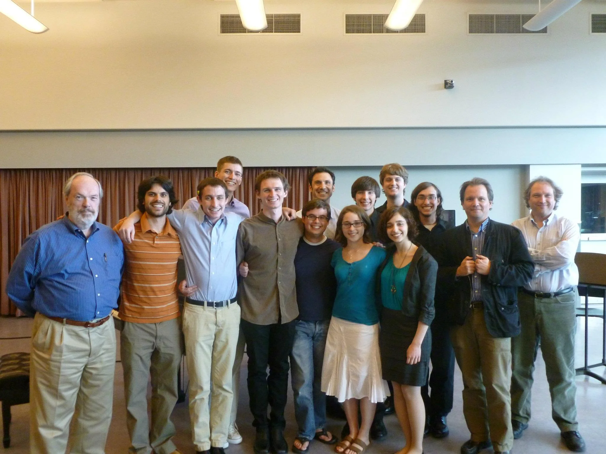 Photograph of my West Chester University Composer colleagues and me in May 2012. Colleagues include Hassan Estakhrian, Jim Doyle, Peter Christian, Andy Norman, Natalie Dietterich, Michelle Saddic, Alex Marthaler, Kyle Benson, and Danton Arlotto. Faculty in photograph includes Dr. Larry Nelson, Dr. Robert Maggio, Dr. Van Stiefel, and Dr. Mark Rimple.