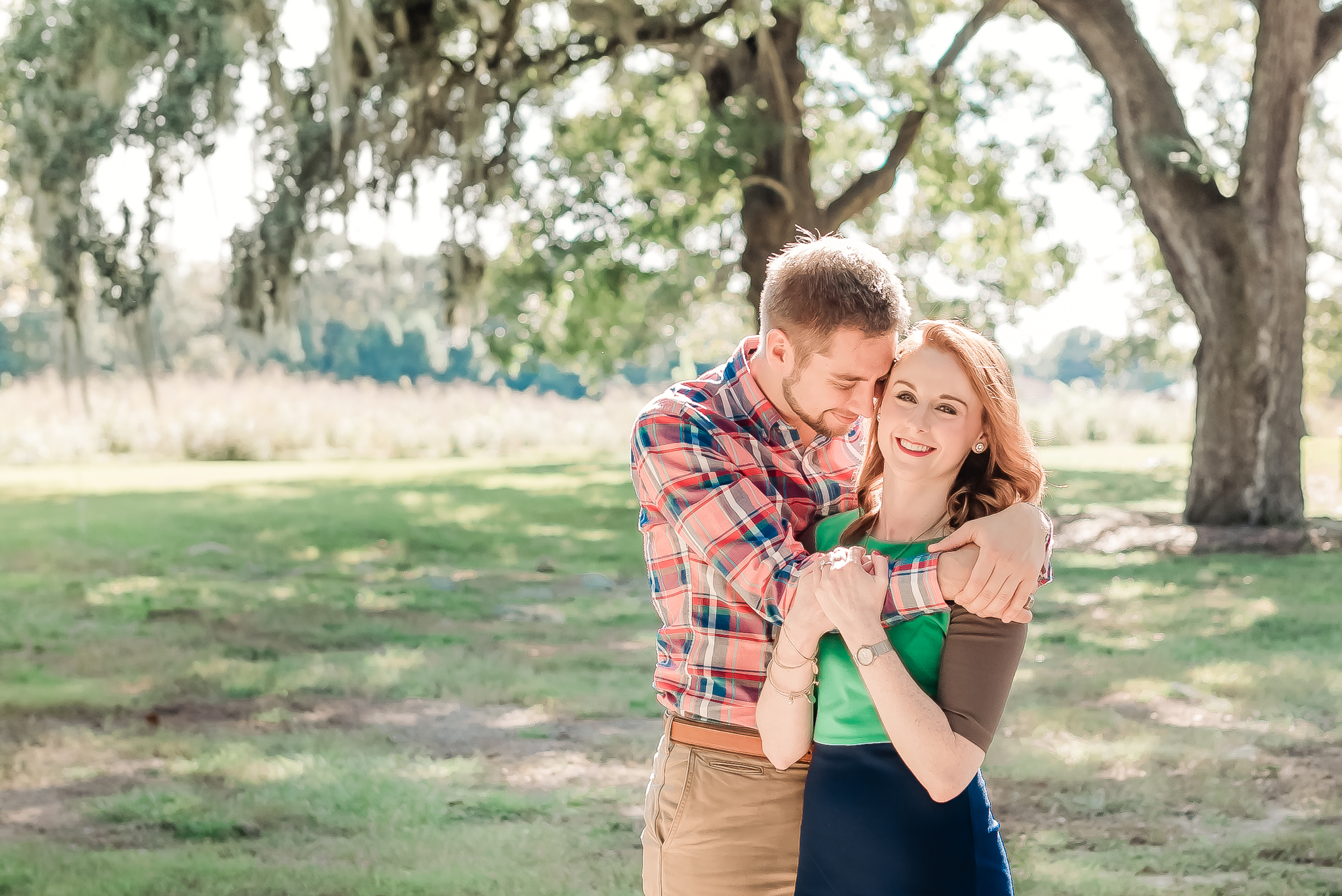 Natural, romantic engagement photos under live oaks and spanish moss, Charleston SC Engagement Photography