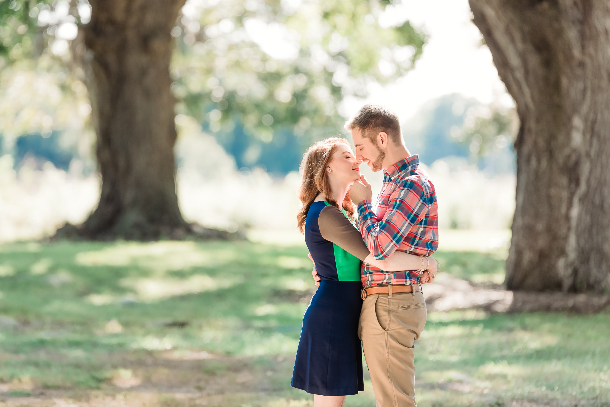 Natural, romantic engagement photos under live oaks and spanish moss, Charleston SC Engagement Photography