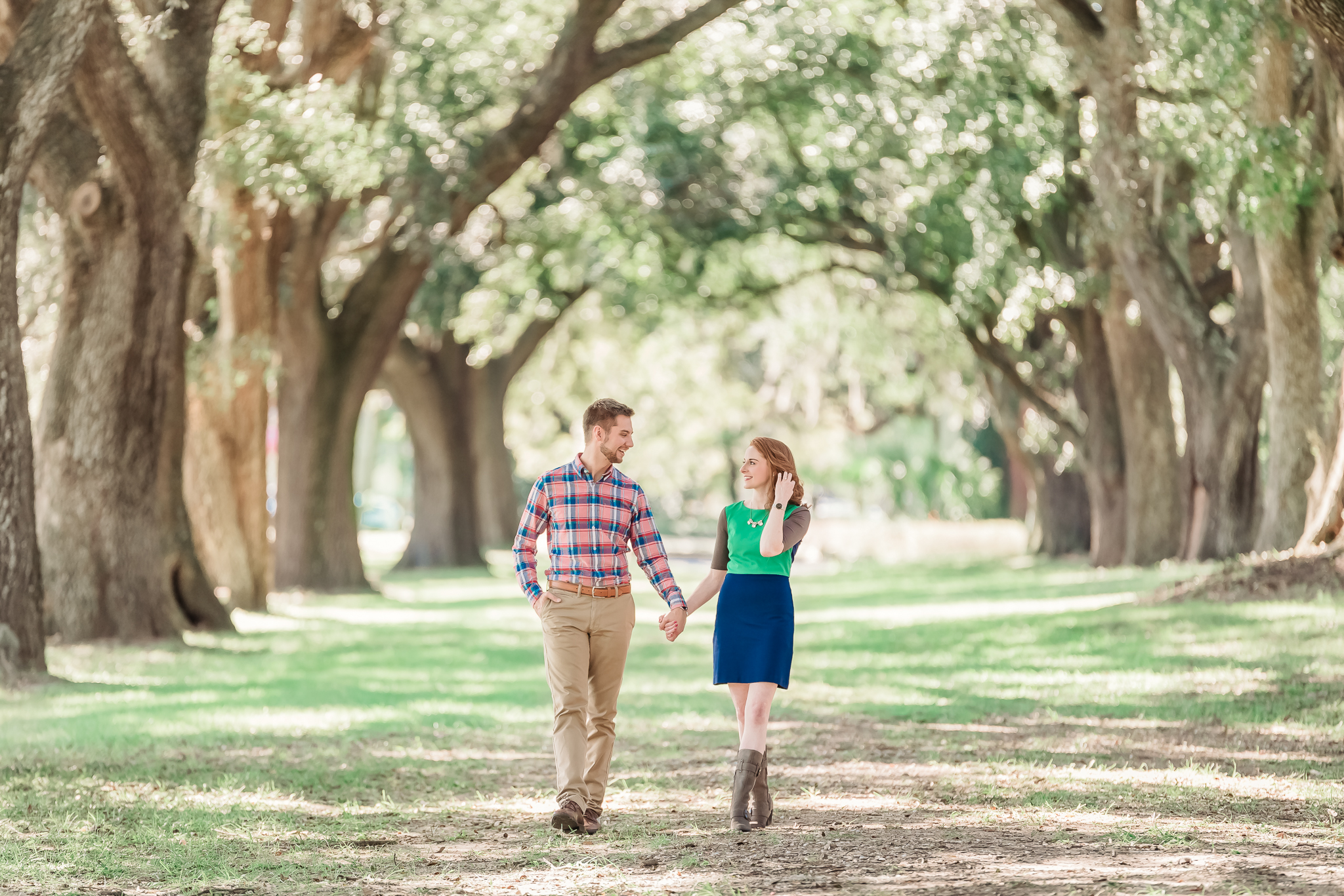 Natural, romantic engagement photos under live oaks and spanish moss, Charleston SC Engagement Photography