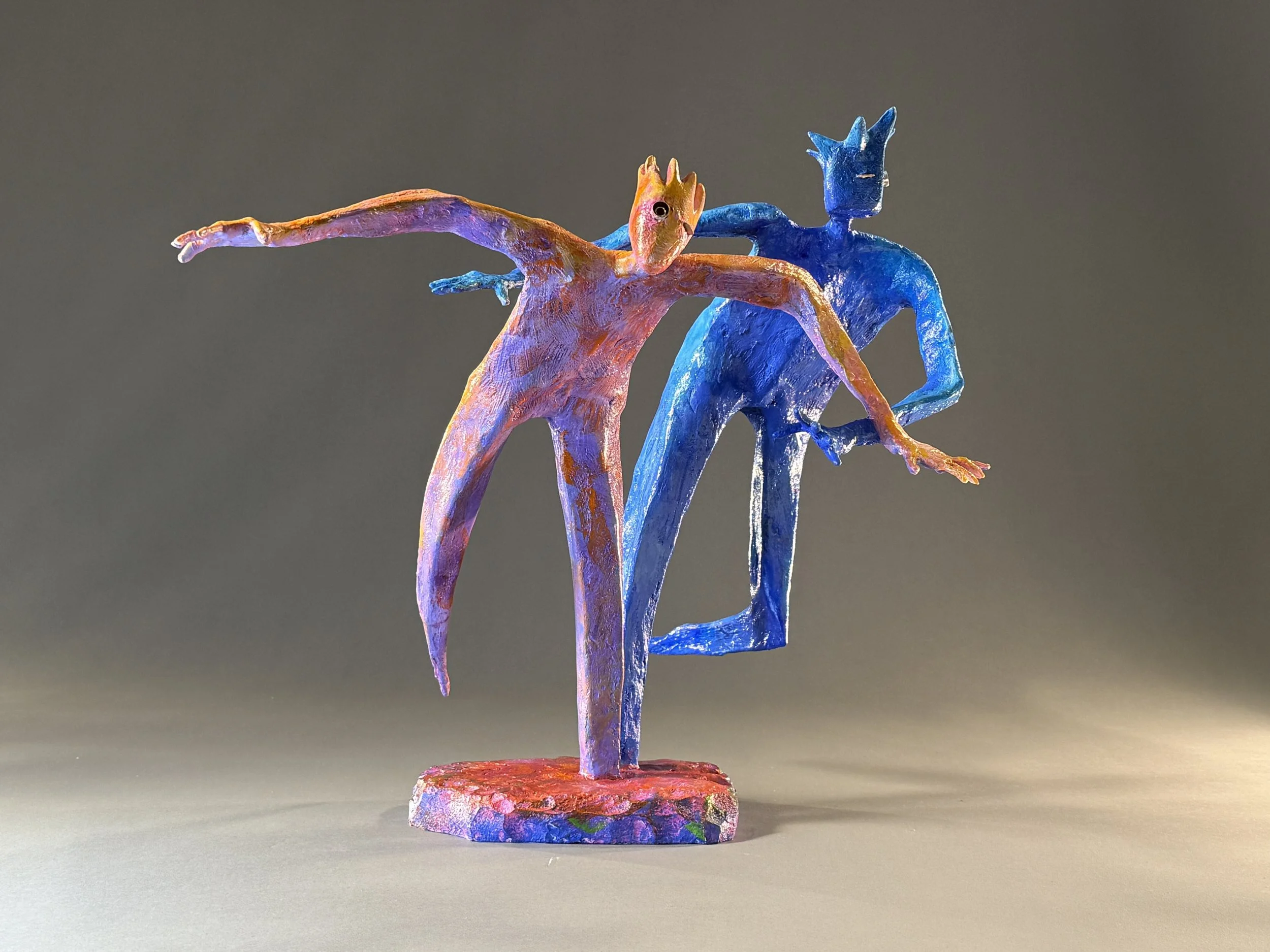 sculpture of anima animus figures in dynamic dance
