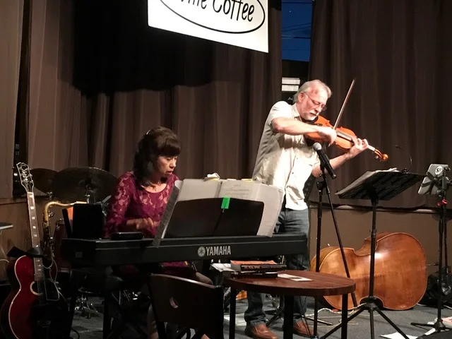 Rick LaRue and Noriko brought Bartok and more to the benefit.