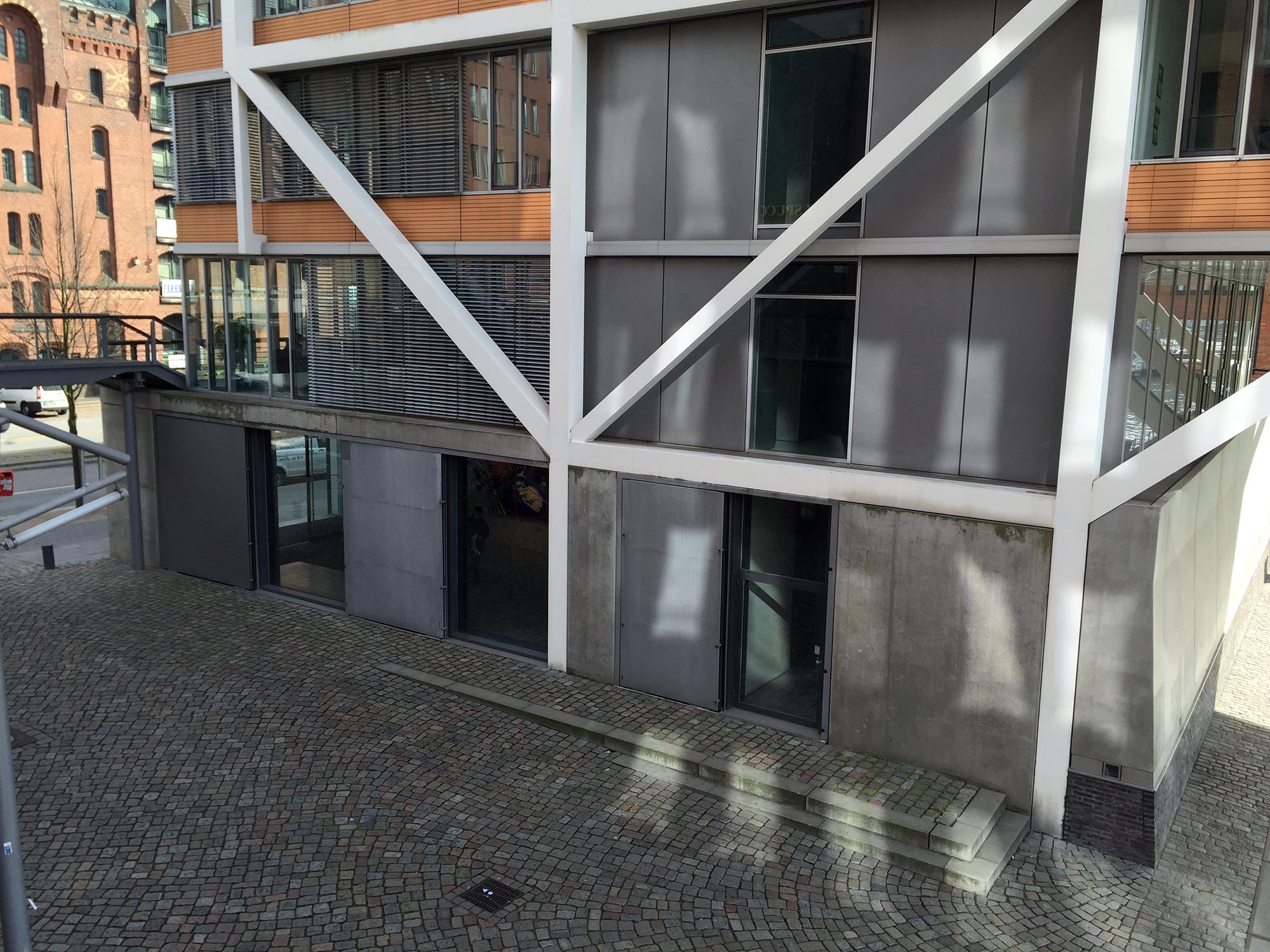 The lower building floors have newly affixed flood doors, gates, and fortifications throughout the district.