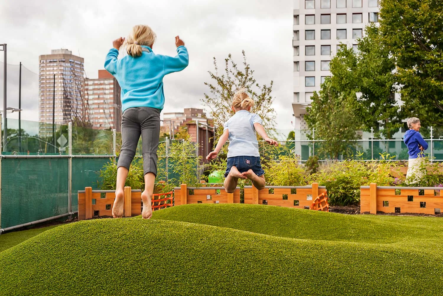 MIT-Childcare-Center_children-playing-turf-landform-Klopfer-Martin.jpg