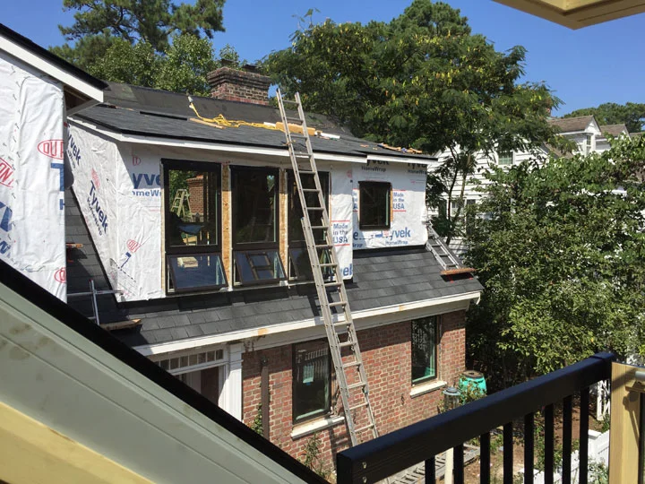 Contemporary Shed Dormers on Colonial Home
