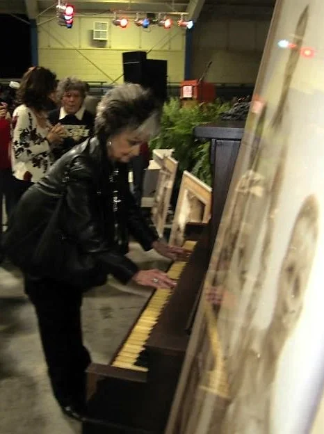 Johnny's sister, Joanne, playing her mother's piano