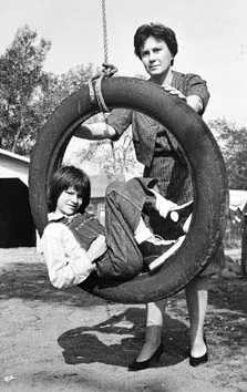 Nelle Harper Lee and actress playing her younger self, on set of To Kill a Mockingbird