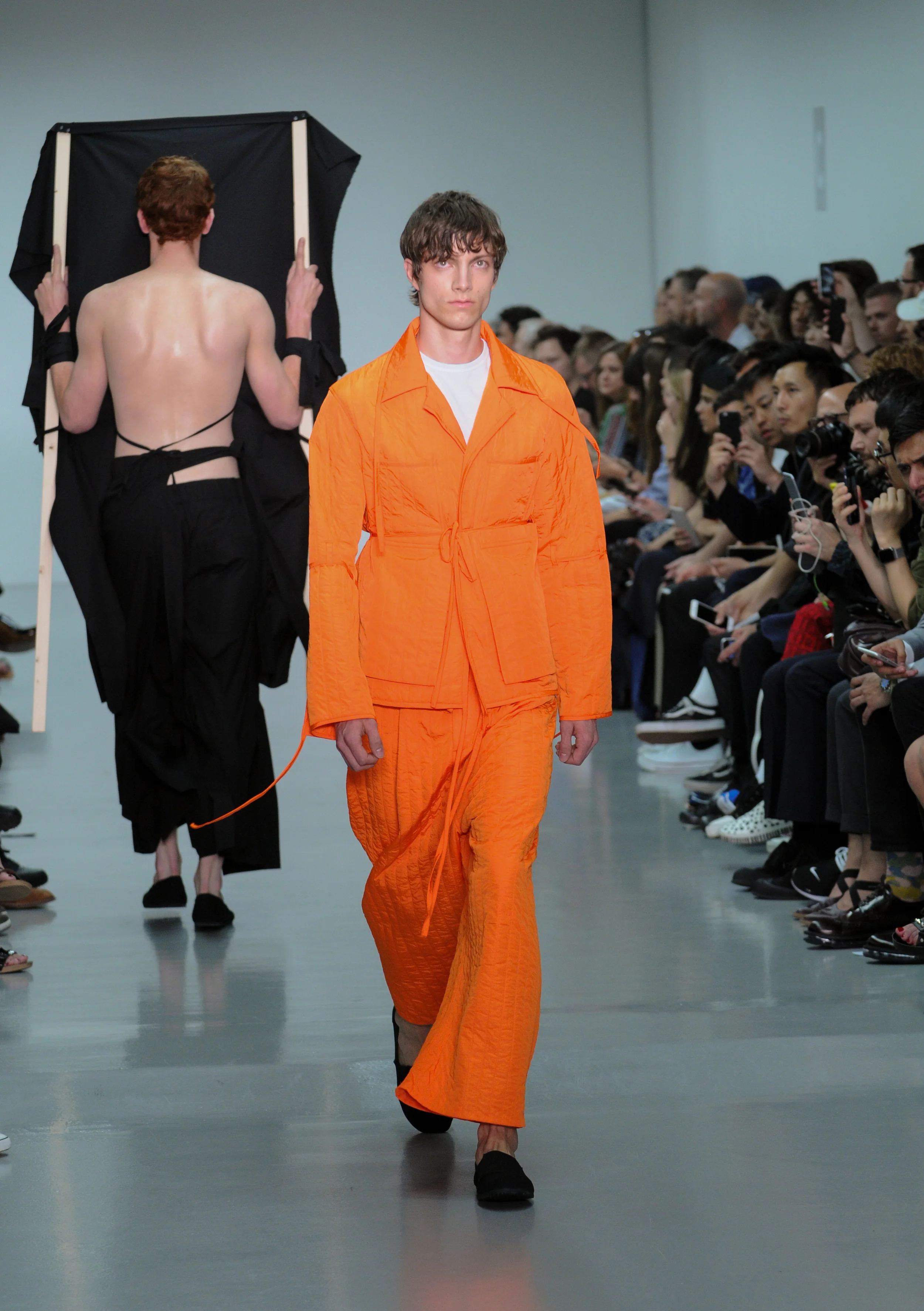 The model wears Craig Green SS16 Collection.