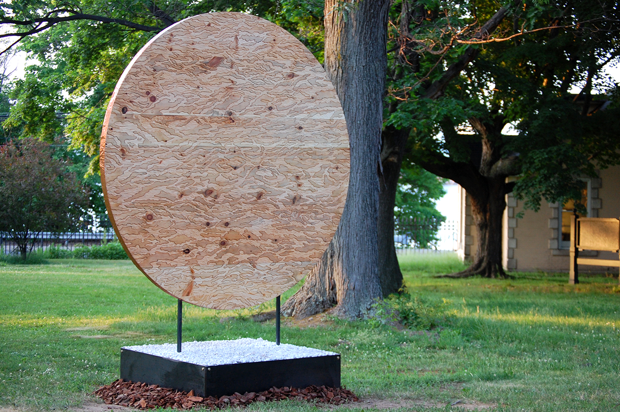 Ripple Effect Carved wood sculpture - pine and spruce, copper, steel and gravel - 7' diameter Installation at New House Center for Contemporary Art, FLUID 2015 Snug Harbor, Staten Island, NY May 2015- March 2016