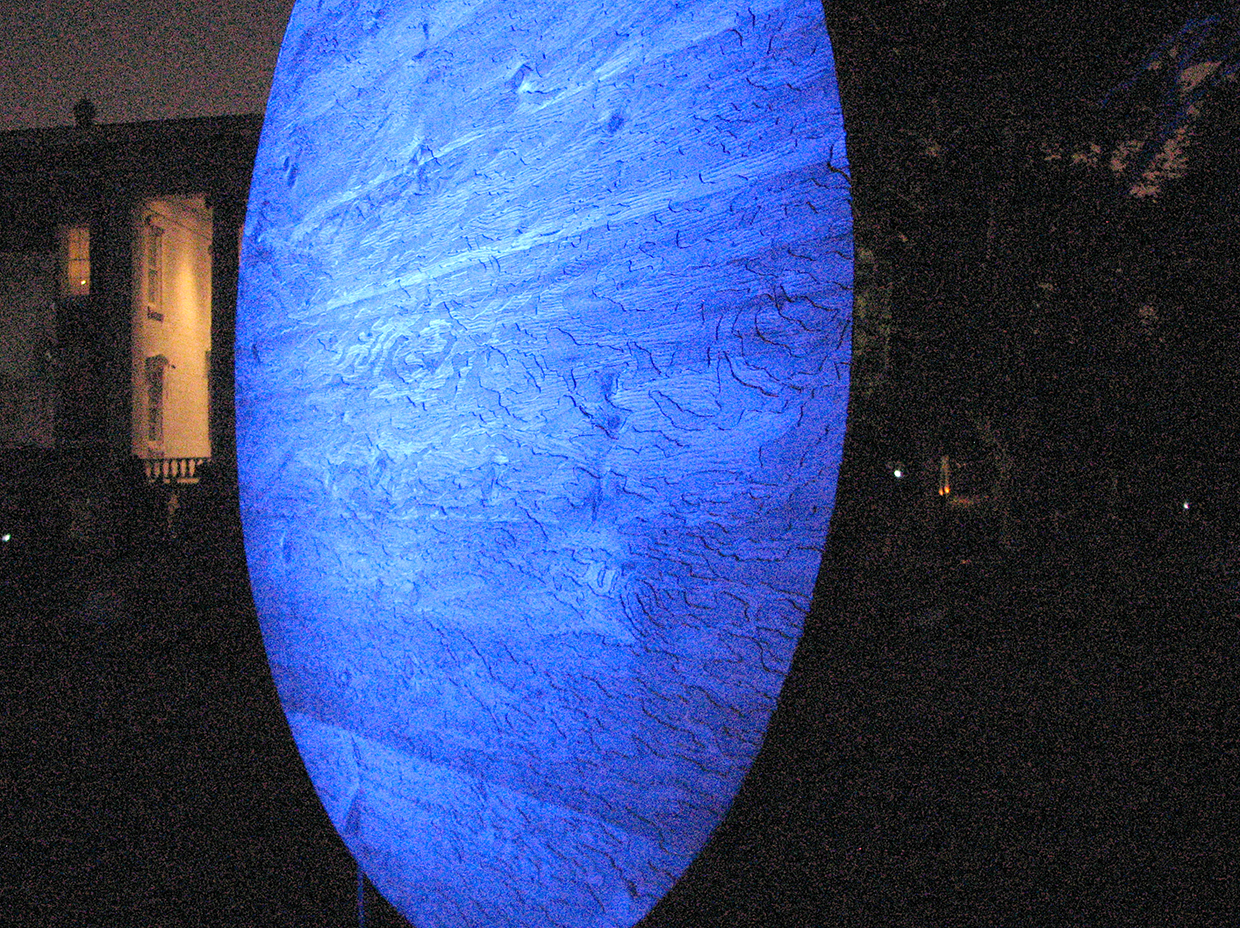 Ripple Effect at LUMEN Festival 2015 Carved wood sculpture - pine and spruce, copper, steel and gravel - 7' diameter Installation at New House Center for Contemporary Art, FLUID/LUMEN 2015 Snug Harbor, Staten Island, NY May 2015- March 2016