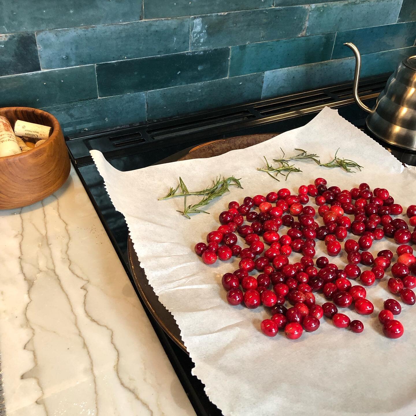 Cheers and Happy holidays! Making cranberry rosemary simple syrup and sugaring them for garnish. The house smells so good. 🥂🌲🍸🍾🌠

#kitchendesign #tiledesign #quartzite #naturalstone #handmadetile #bluetile #happyholidays #christmascocktail #fest