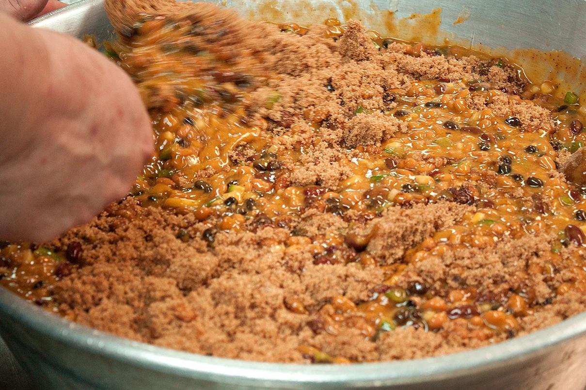 Mixing in the brown sugar, after our Bullpen BBQ sauce and bourbon were added.