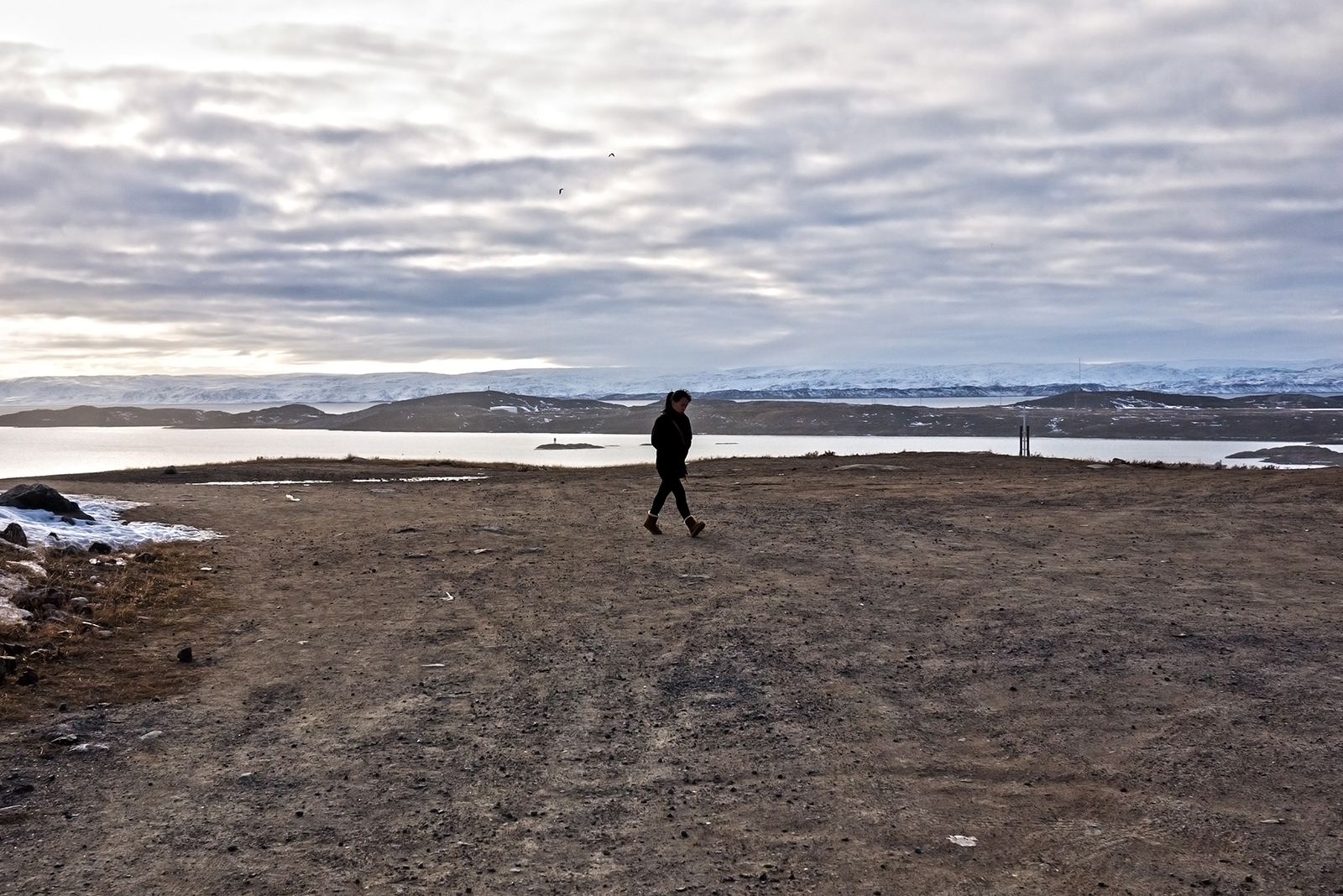 Iqaluit: woman walking to school