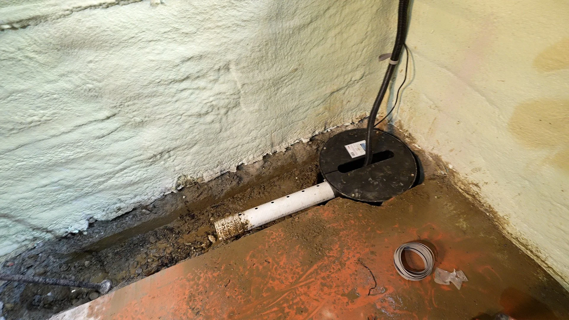 sump pump pit installed in basement