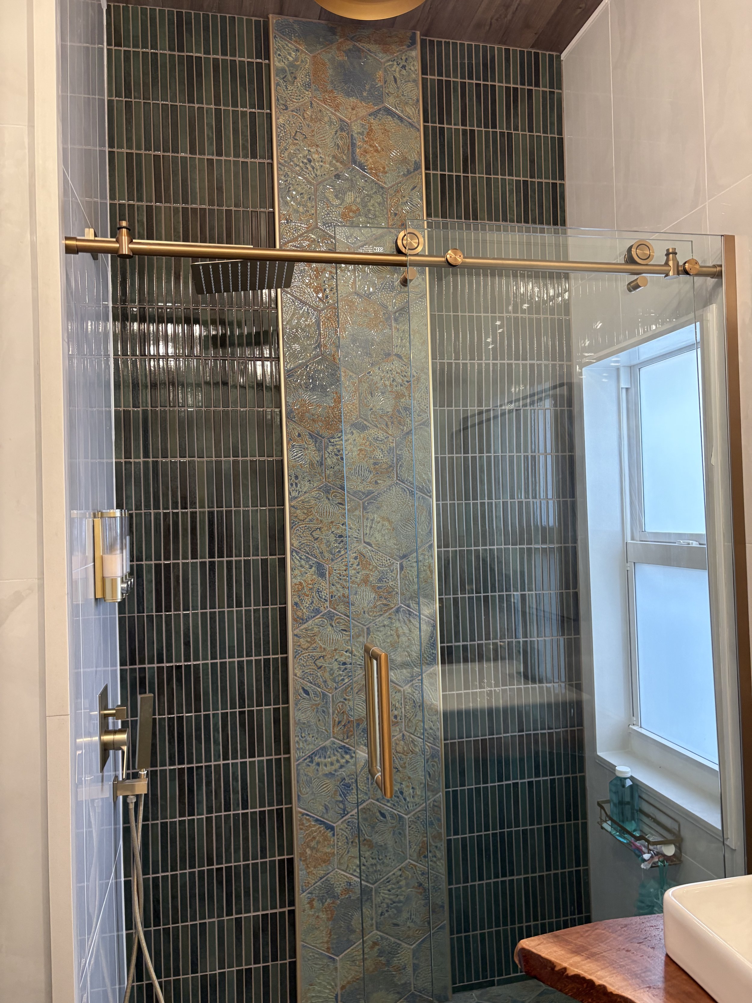 TIle Shower with Sliding Glass Doors.jpeg