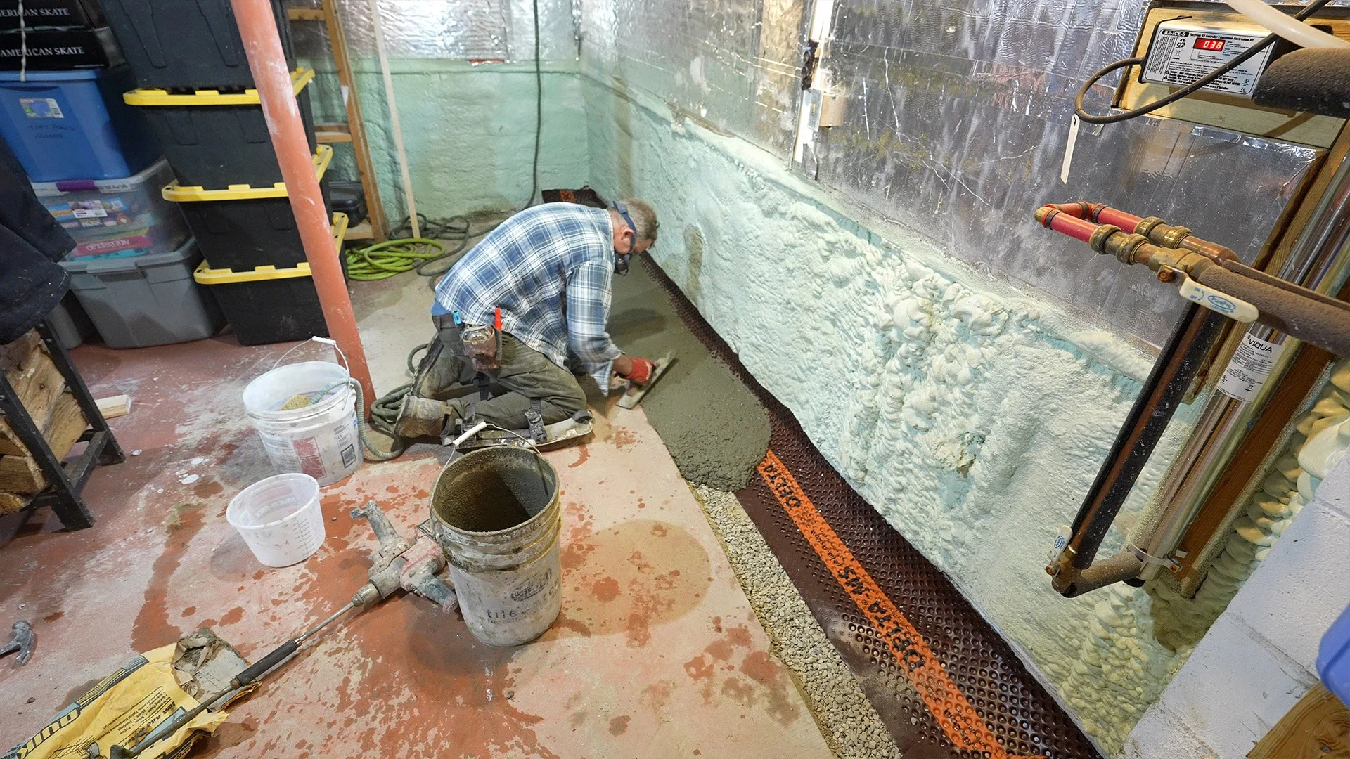 tooling concrete over an interior French drain system