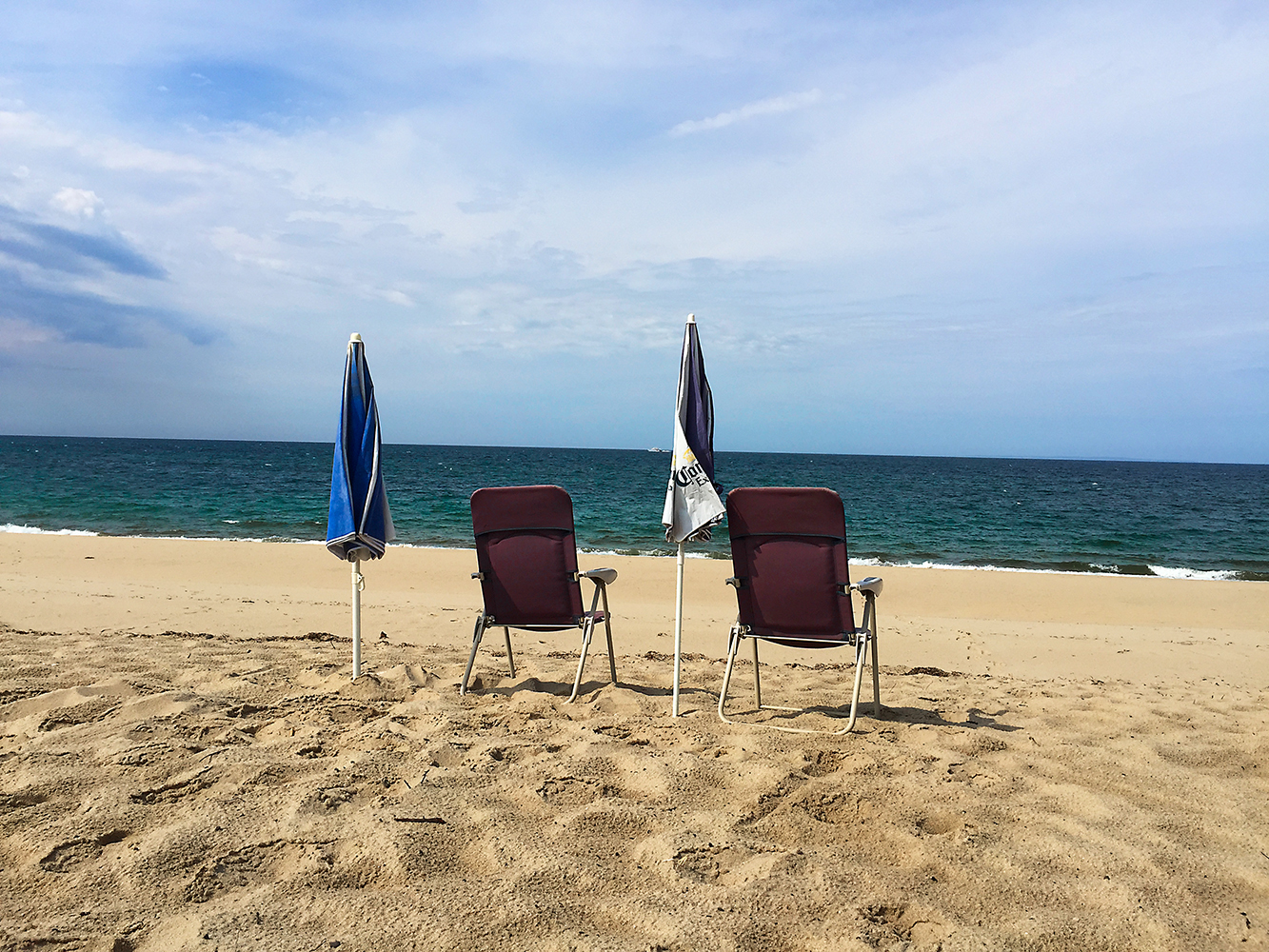 Brown Chairs on the Beach