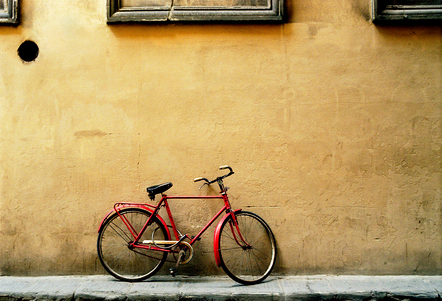 Red Bicycle Bare Wall