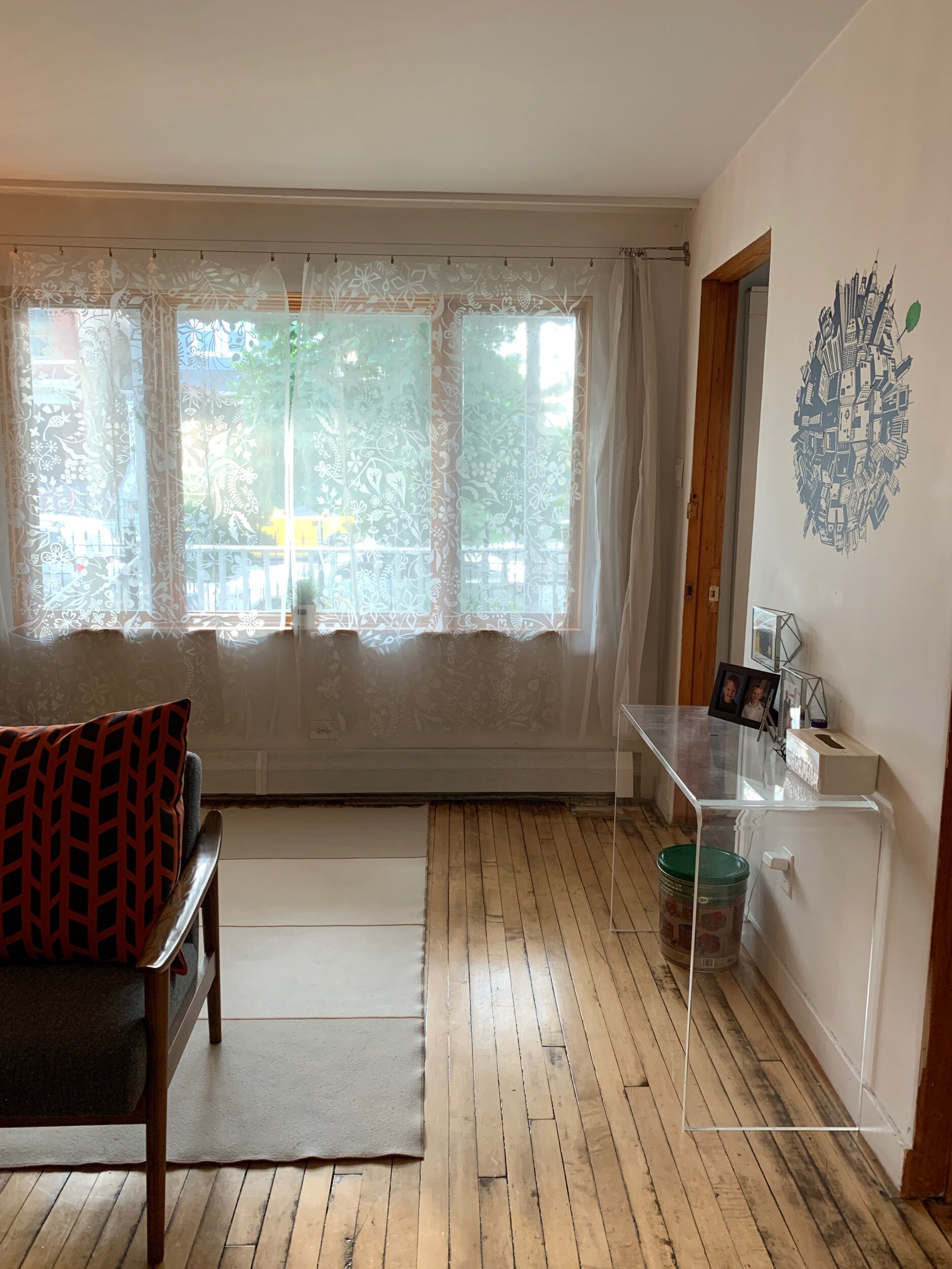 New front windows, refinished floors.