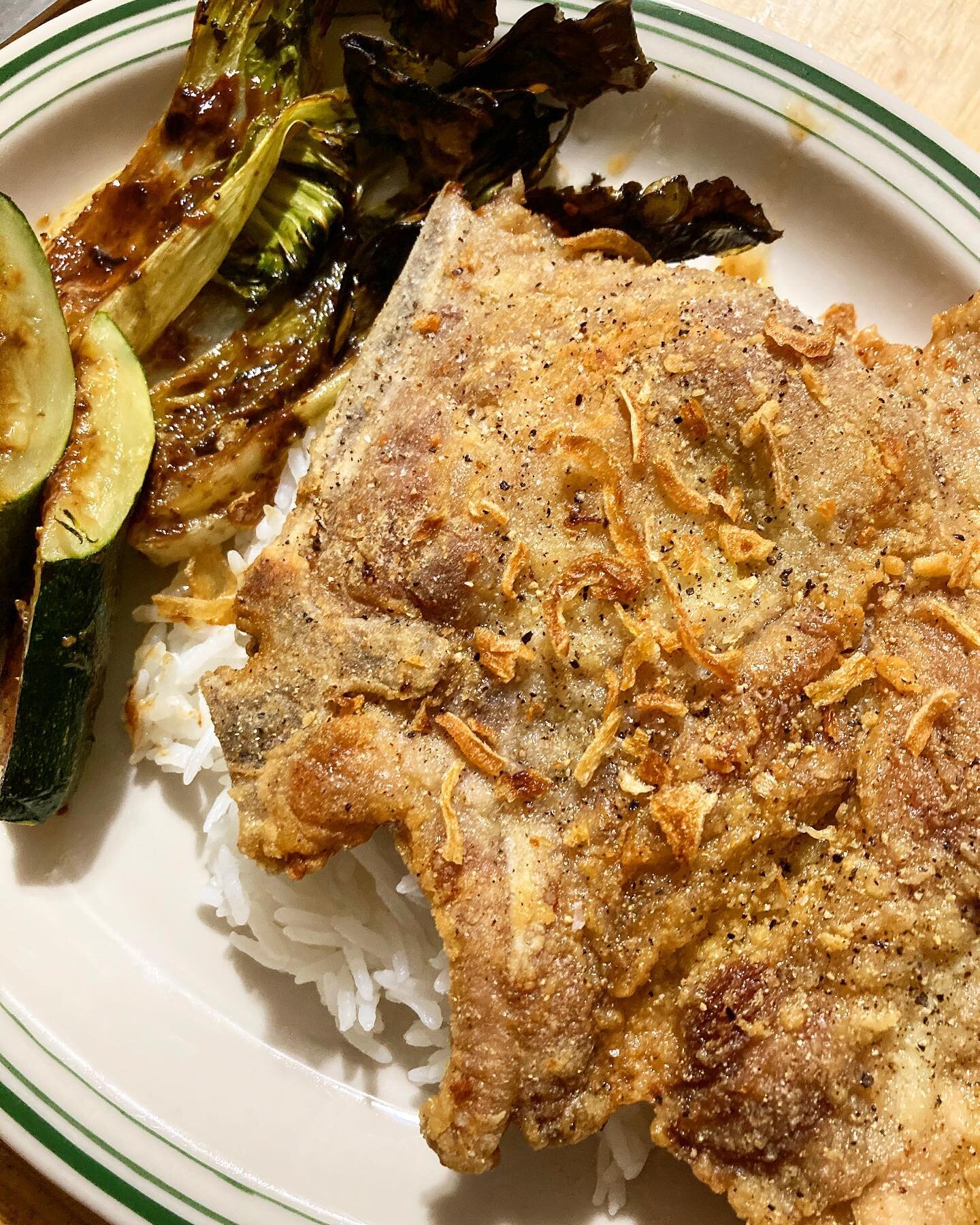 Crispy salt and pepper fried pork chop that happened to be gluten free. Used a mixture of potato starch and chickpea flour for the dredge.