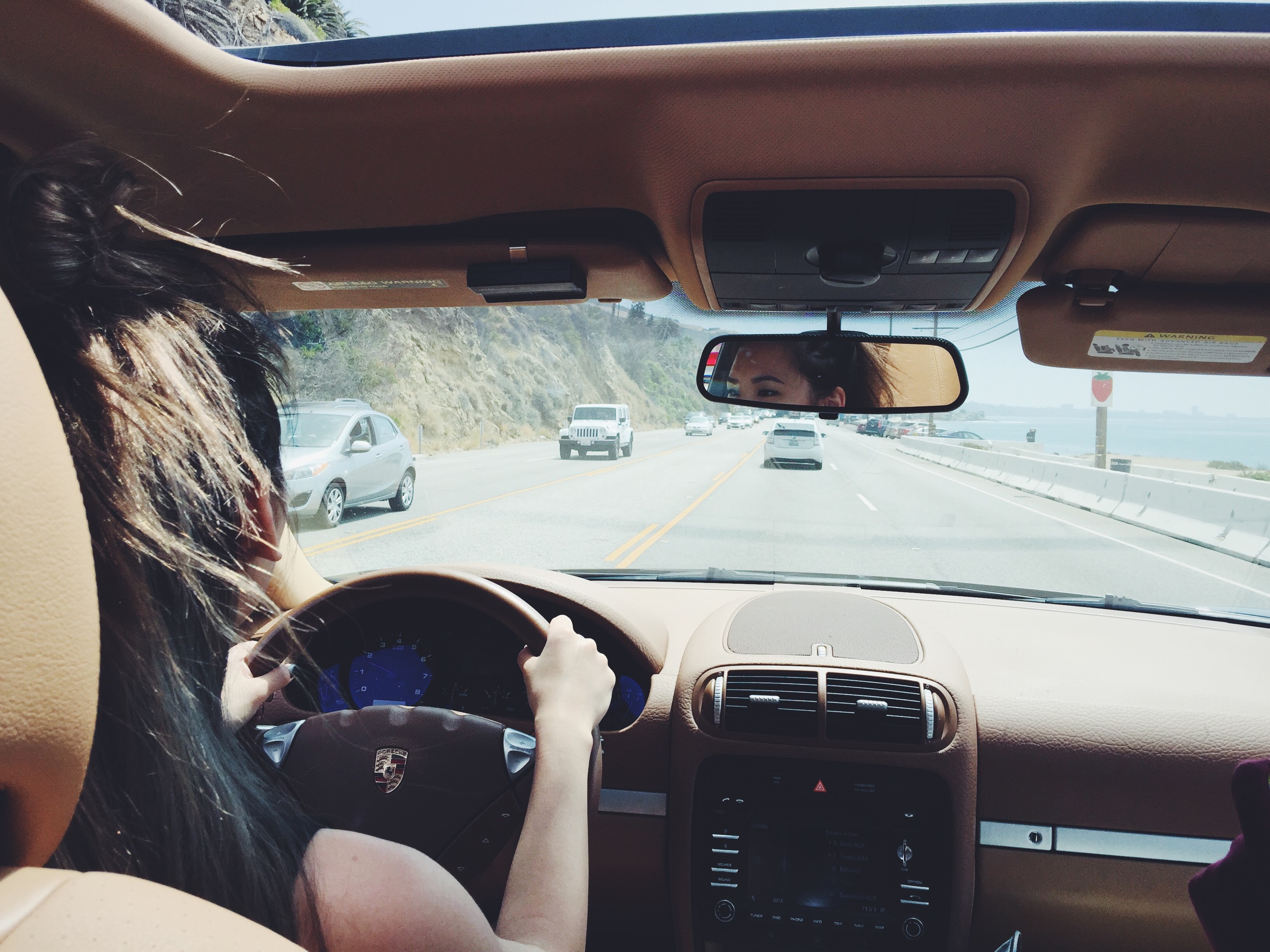 A picture of me driving taken by my aunt Ti-An sitting in the backseat