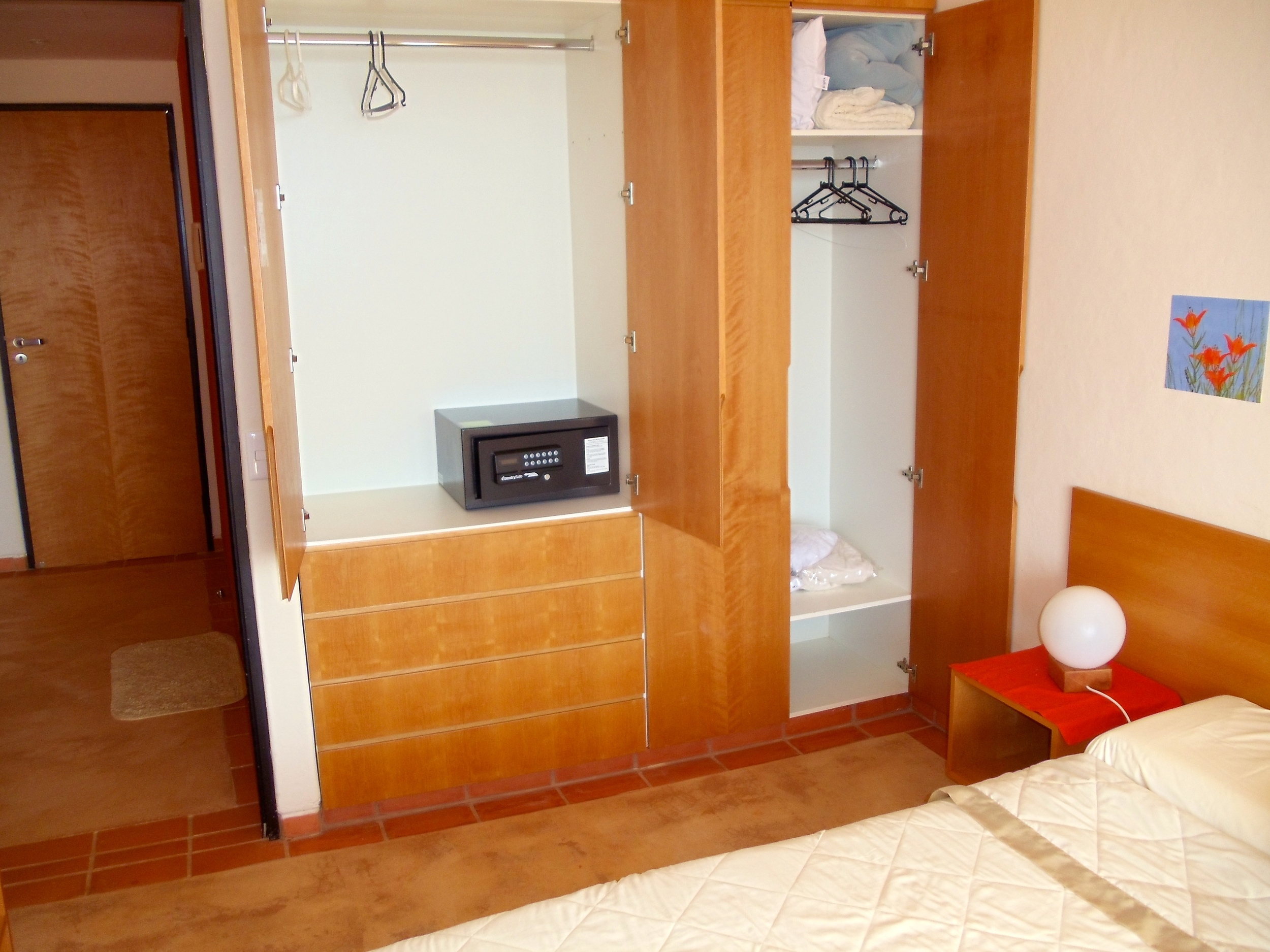 Alegria - bedroom closet with safety box