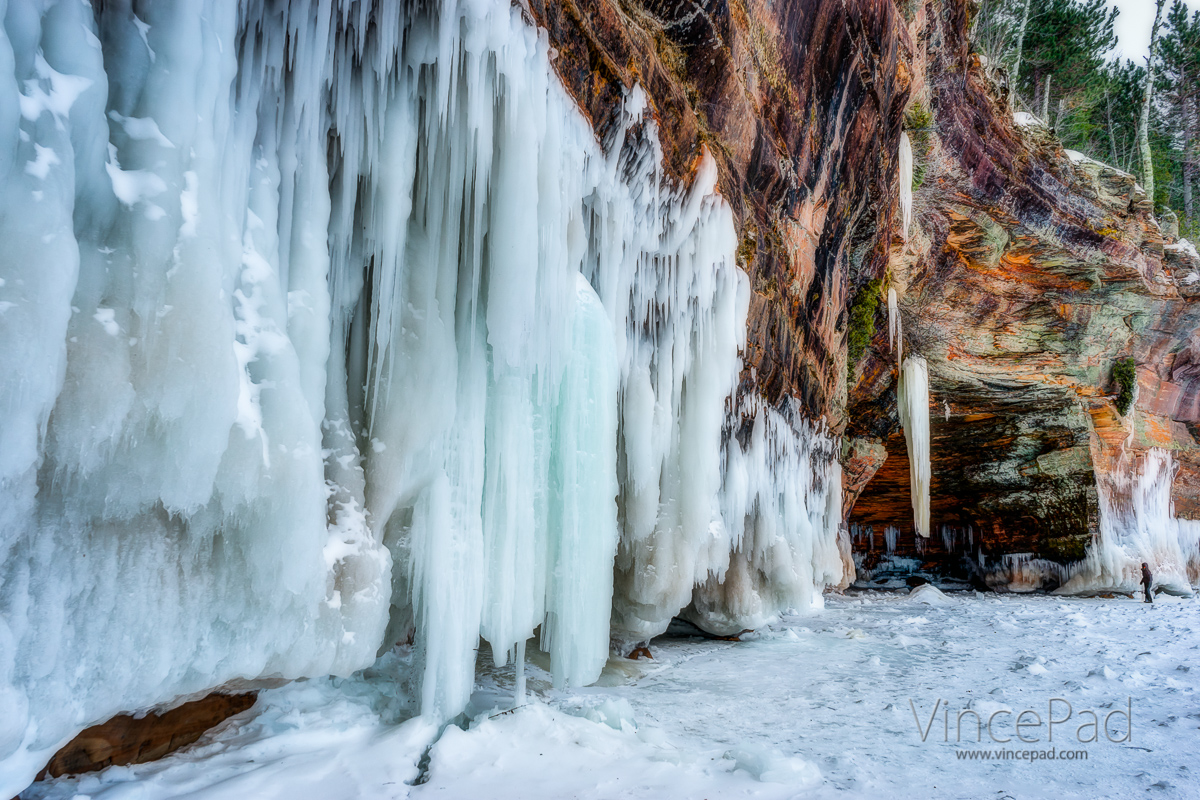 The colors in the ice and bluff here were mind blowing. And look at the size of the icicle in the background compared to the person standing near it! It was unbelievable!