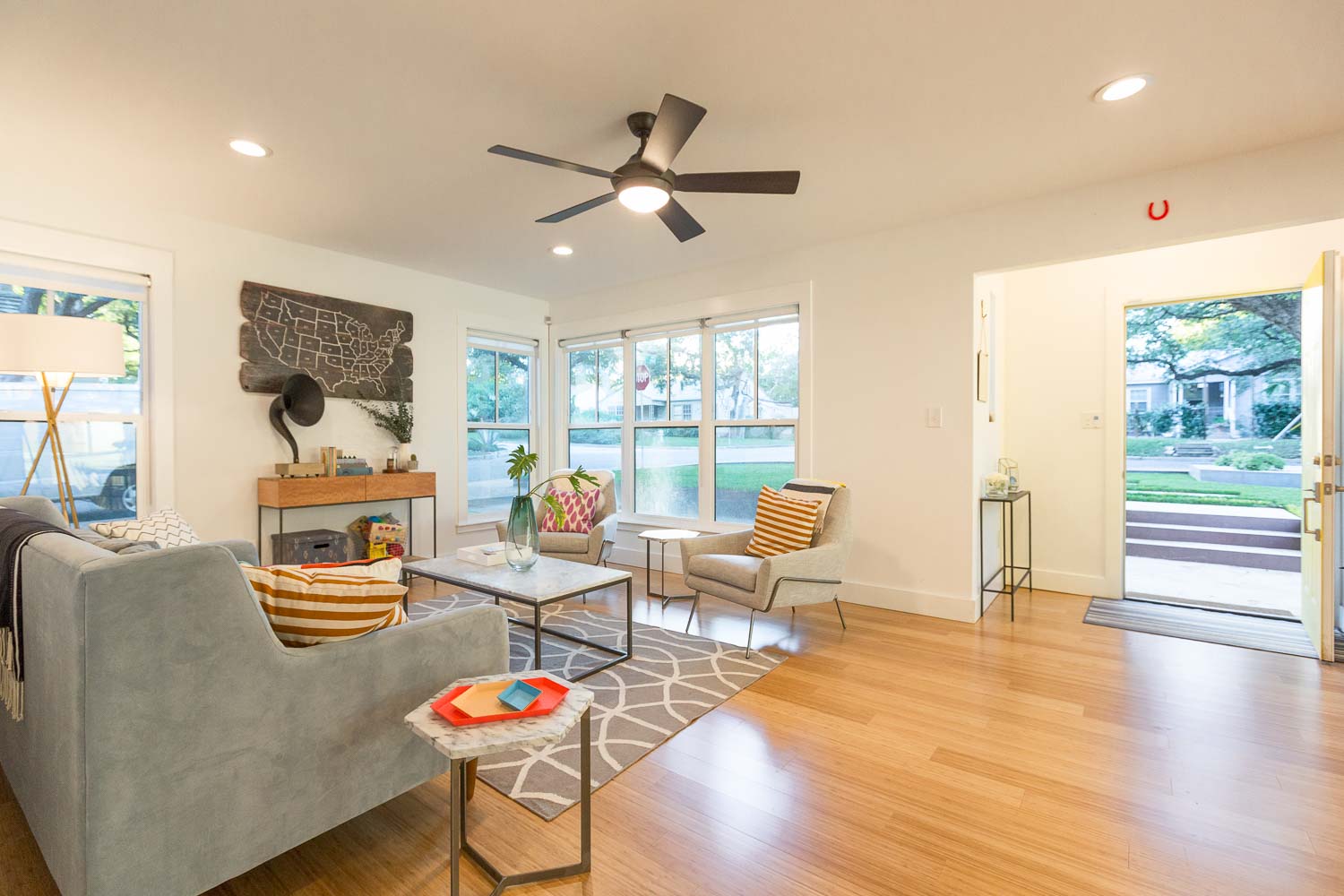 The formal living room has been completely remodeled with new windows and finishes. We love the entry nook common in 1940s homes. The durable bamboo floors are perfect for a family friendly home!