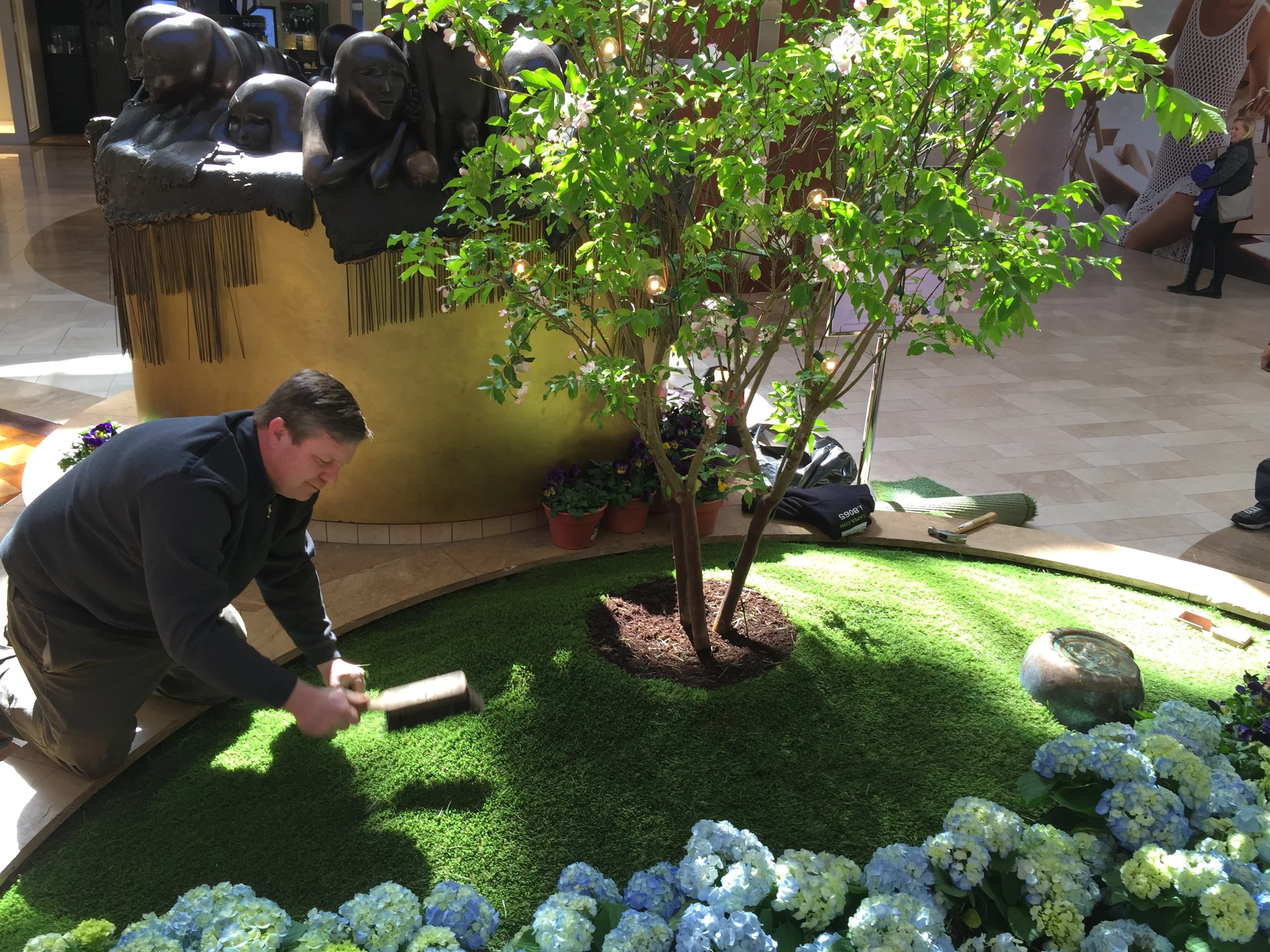 Finishing touches on the lawn.