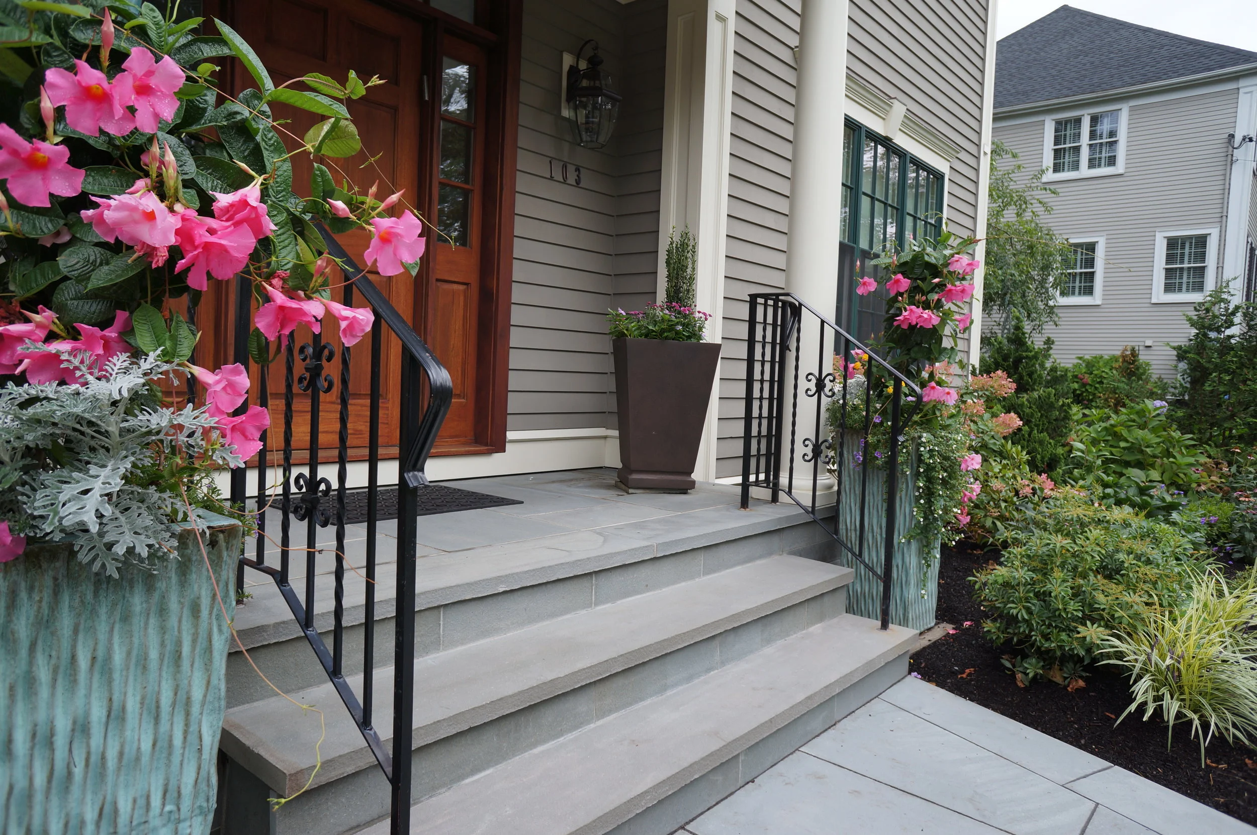  The original builder had used bricks on the stair's rise. &nbsp;We replaced it with hand cut bluestone pieces to give the home a more modern look. 
