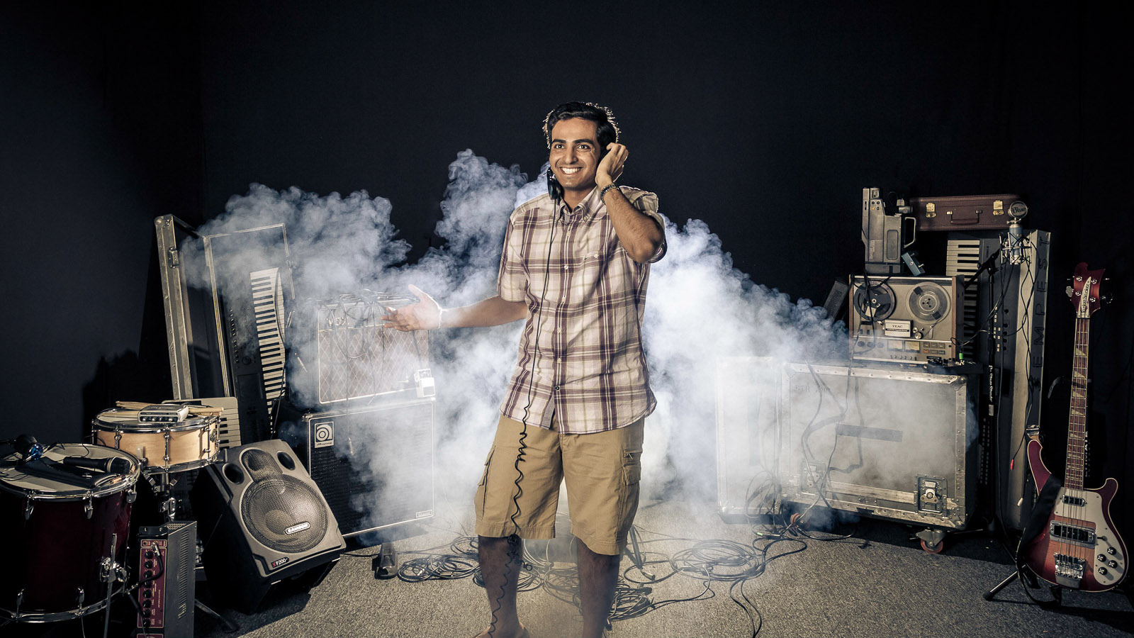 Testing the light and special effects on myself during a band promo photo shoot. Don't worry, I am still a photographer. The final shot can be seen here . During the shoot, most of the time was spent setting up the scene, lighting, and fog removal after shooting. We would shoot 3 shots and then wait 10min to clear the fog.