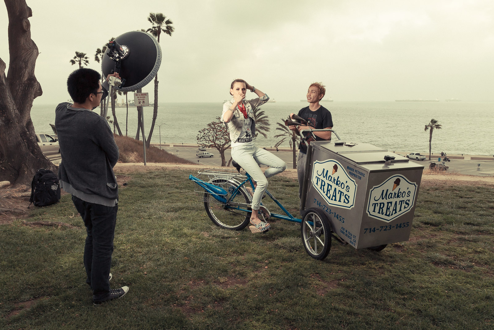 The resulting images from this photo shoot may melt you before the frozen treats melt in the heat. It was a crazy shoot day with 7 locations all over Orange County. This was our 6th stop which happened to be in Long Beach. The weather was all nice and warm in the OC and got all cold, windy, and chilly when we had to shoot outside in Long Beach. On top of that, this crazy bagpipe player pretty much made us lose our minds. He did not stop for the entirety of our shoot. I like quiet sets with good background music. Enough said. Check out this paparazzi video someone took: http://www.youtube.com/watch?v=a7SC7elfFvo . Yeah. The final series of images from this photo shoot can be seen on our Behance . Follow us on there!