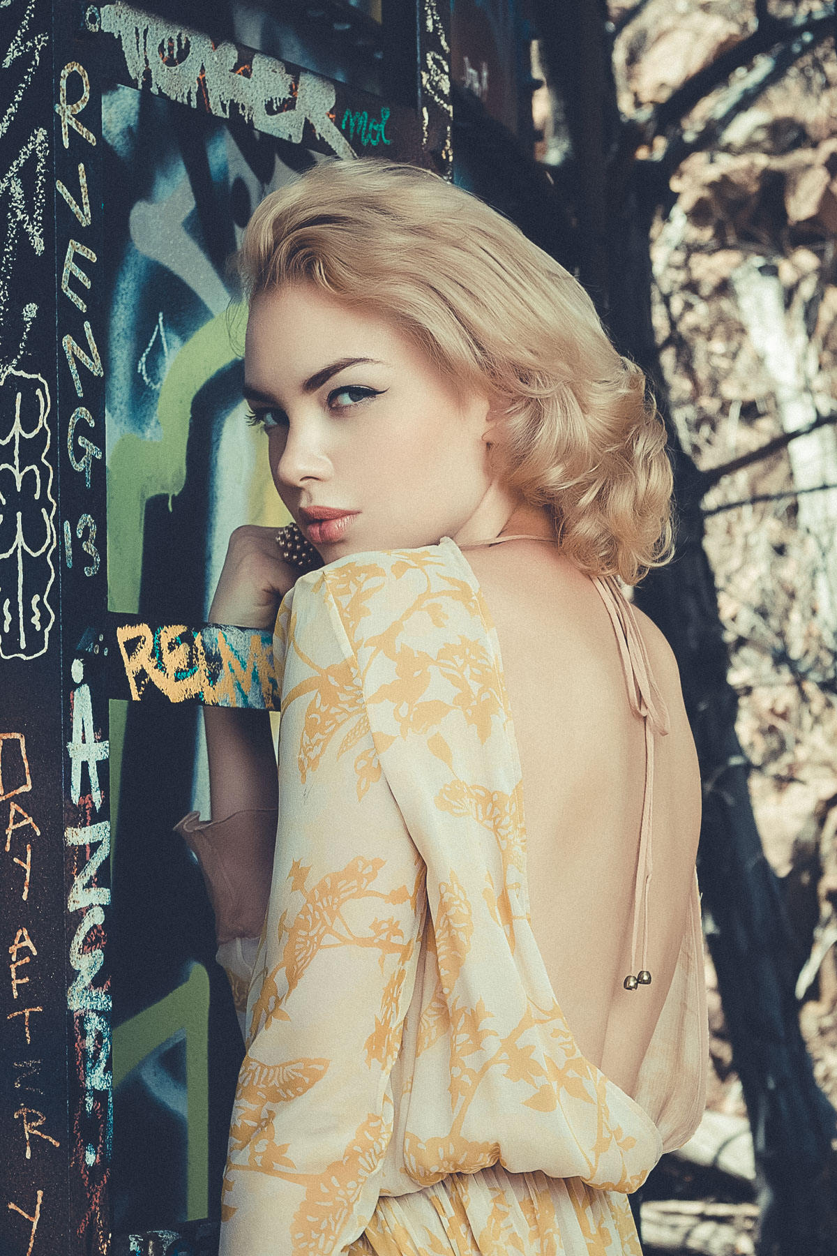 Back shots are difficult. But they are beautiful when they work properly and when the back of the dress has a low cut. This was a crazy on-location shoot that took its own twists and turn. Determination is what got us through this shoot.