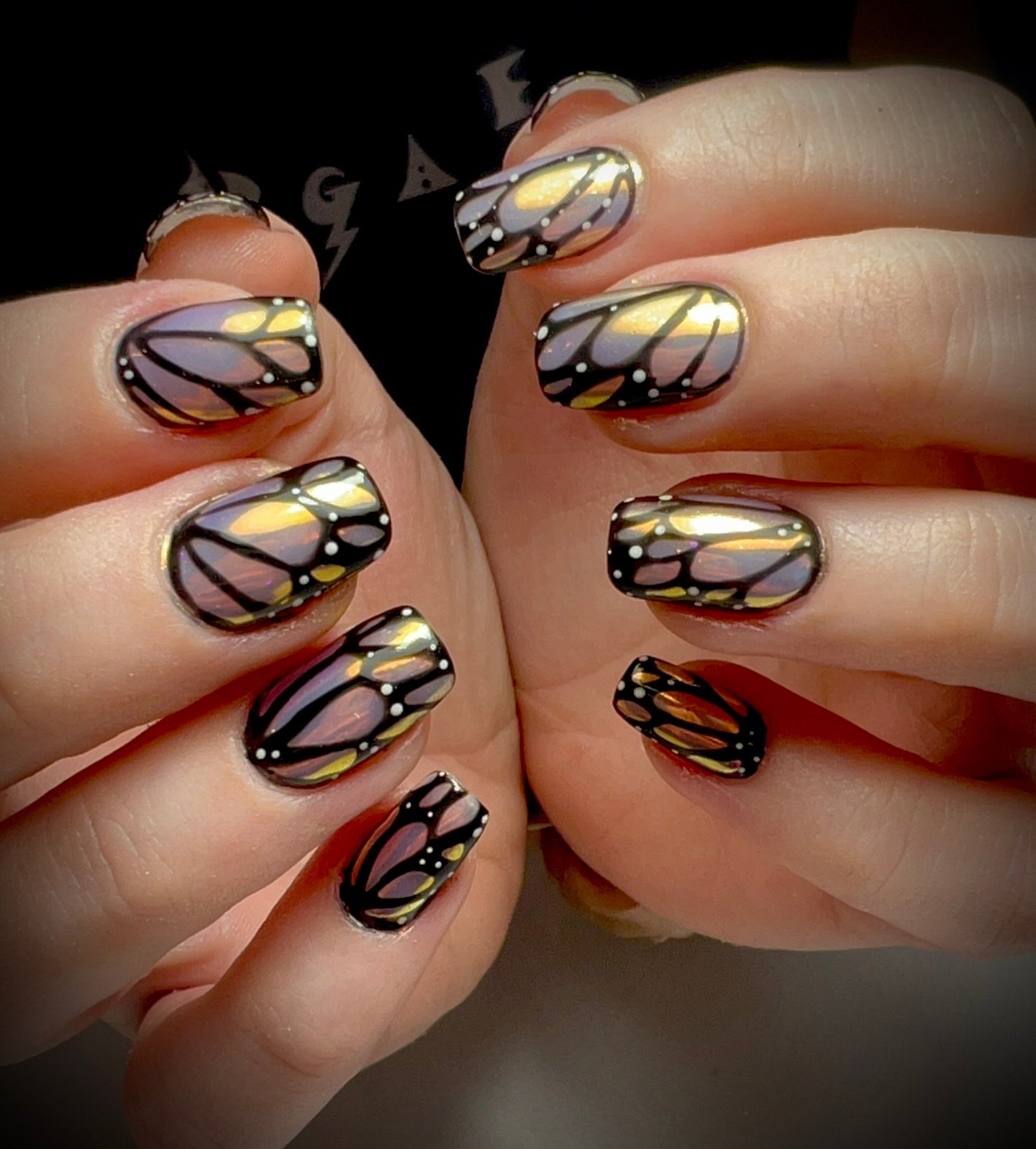 ✨ A classic nail art design that will be requested time and time again&hellip; and for good reason.

These butterfly inspired nails are one of those timeless looks that never stops being stunning. The bold black outline, delicate detailing and glowin