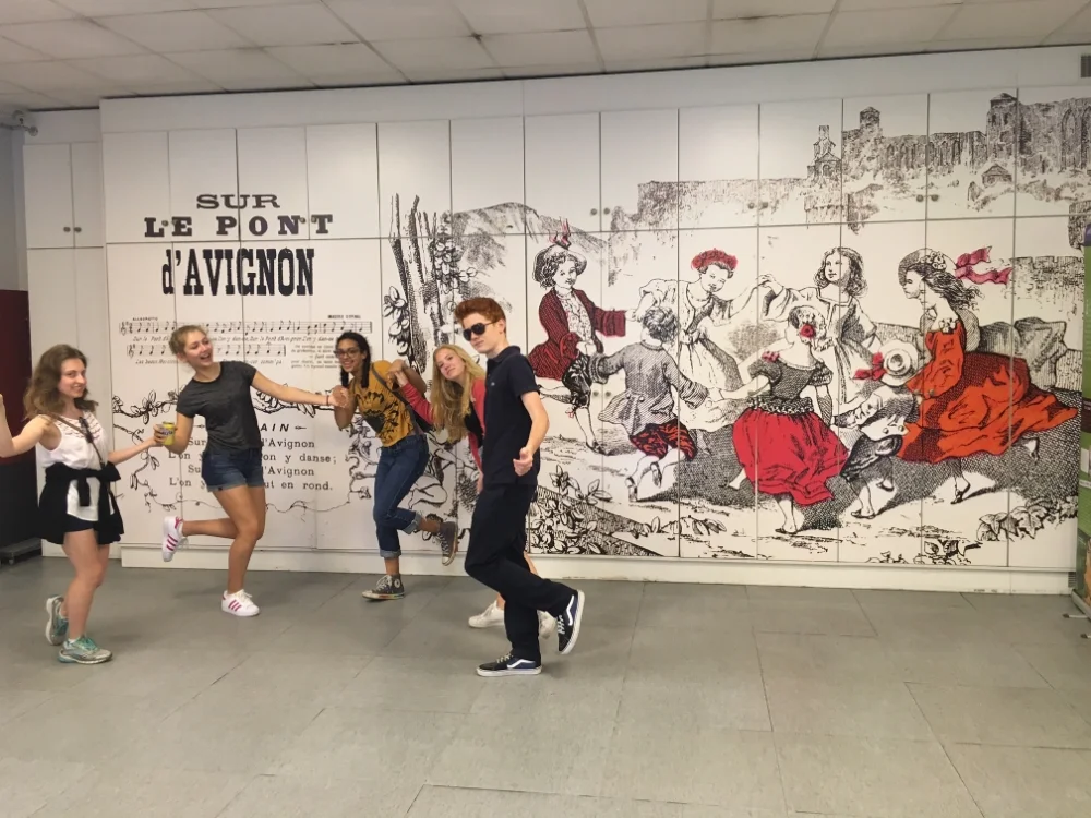 The song calls for everyone to join hands and dance merrily in a circle. We did our best to follow the instructions on the wall.