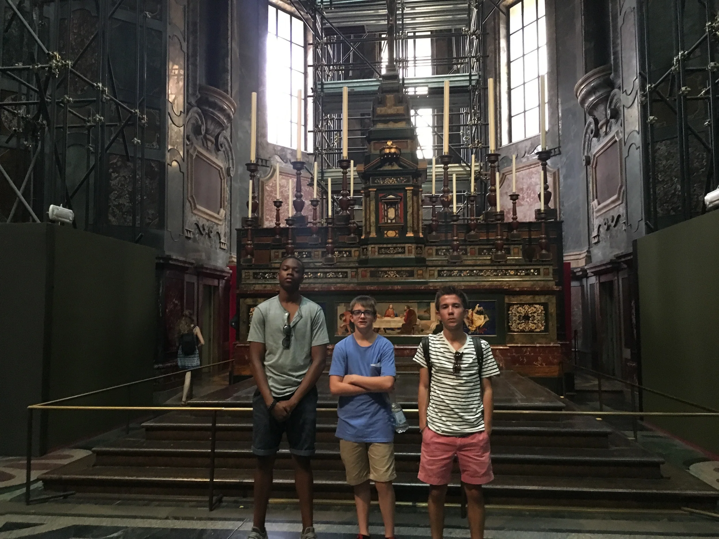 Isaiah, Henry and Christian strike poses in front of the altar in the Medici chapel