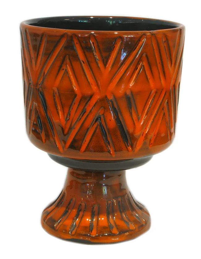 Ceramic vase in orange with pedestal base: $55