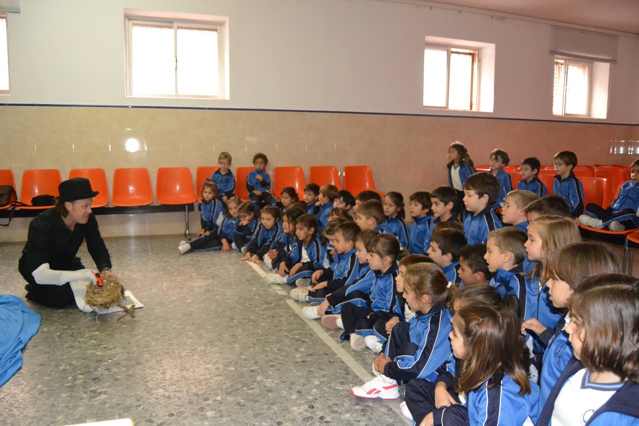 One student in this group was quick to point out that it wasn't a real swan...though quickly forgotten as he was so engaged in the story. Note the line of masking tape on the floor - this is to give me some space, as they get engrossed in the story, the students tend to move closer and closer towards you until they're practically on top of you.