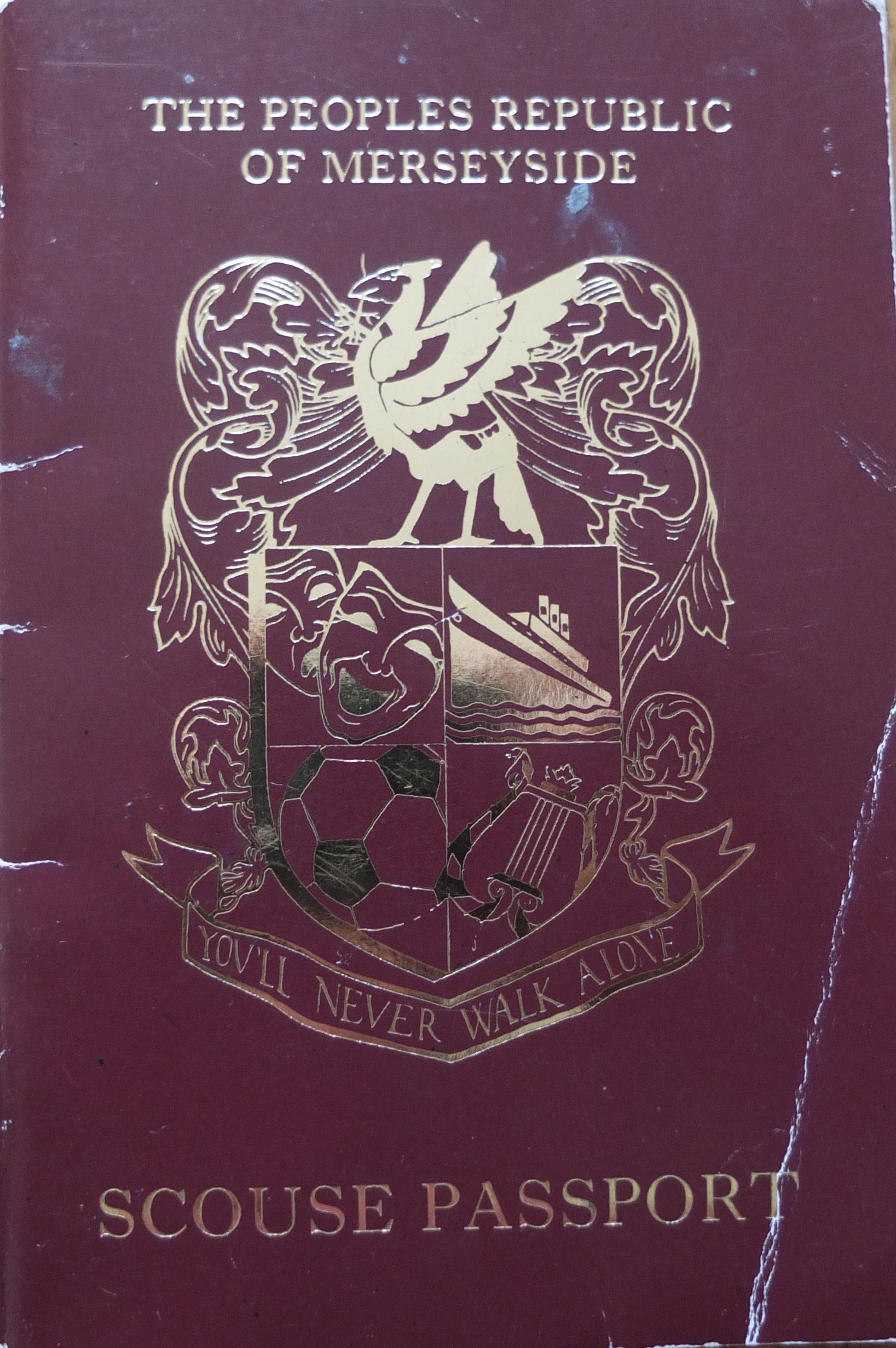 Charlies Liverpool passport....