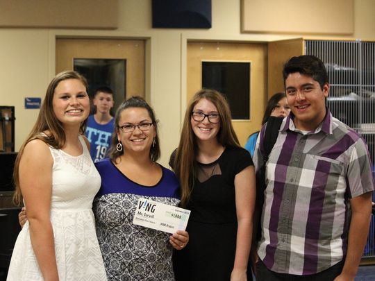 Students surprise Buckeye coach with $1,000