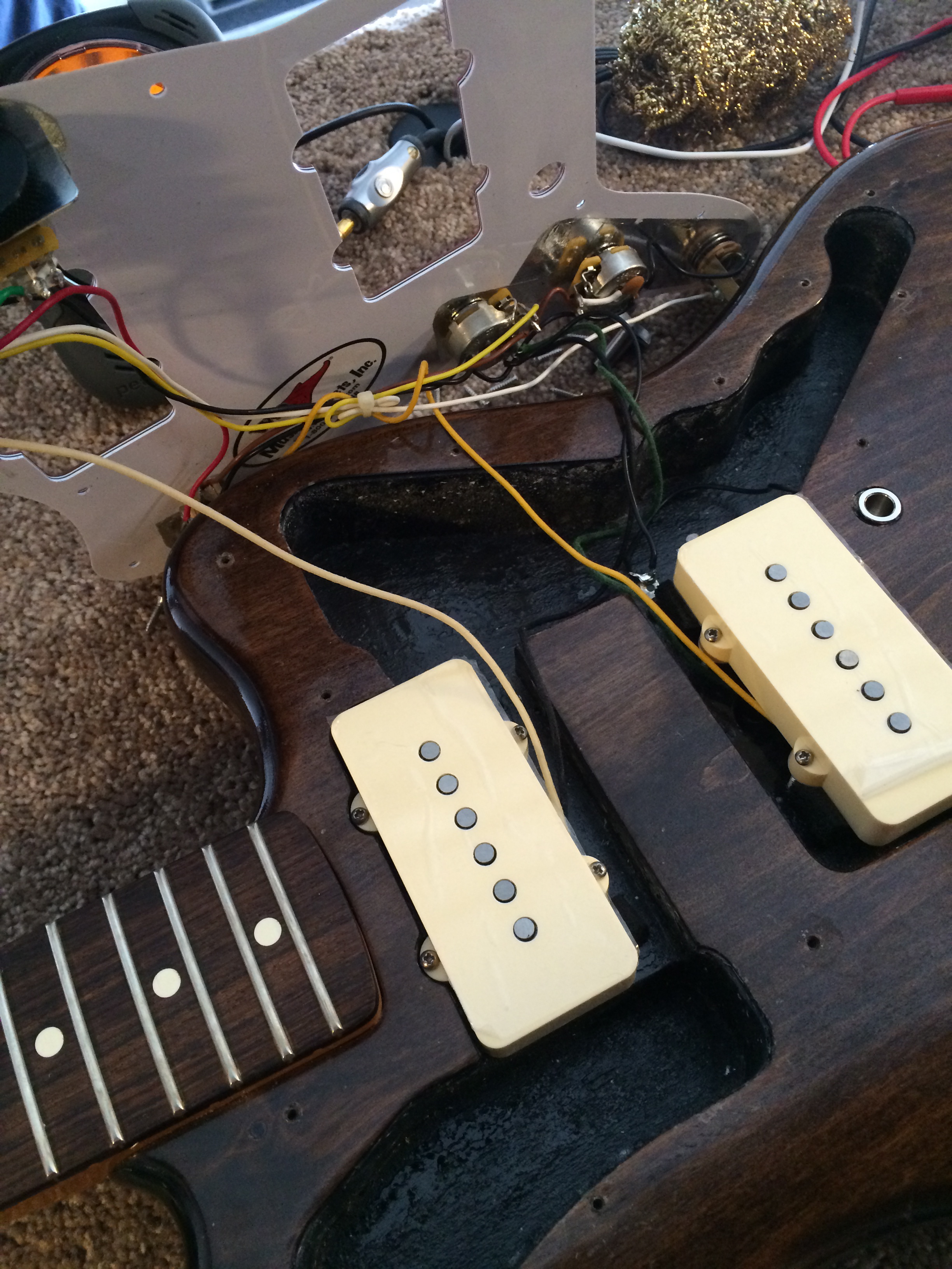  Swapping out stock pickups with new handwound Novaks!&nbsp; 