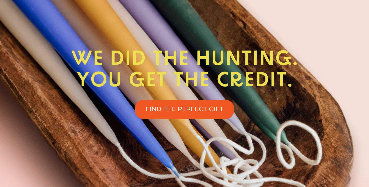 "We did the hunting. You get the credit. Find the perfect gift" Image of colorful taper candles in a bowl