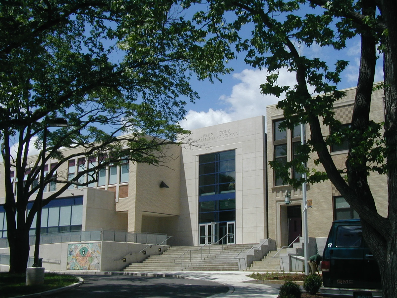 view of main entrance with addition on left and original 1931 building on right