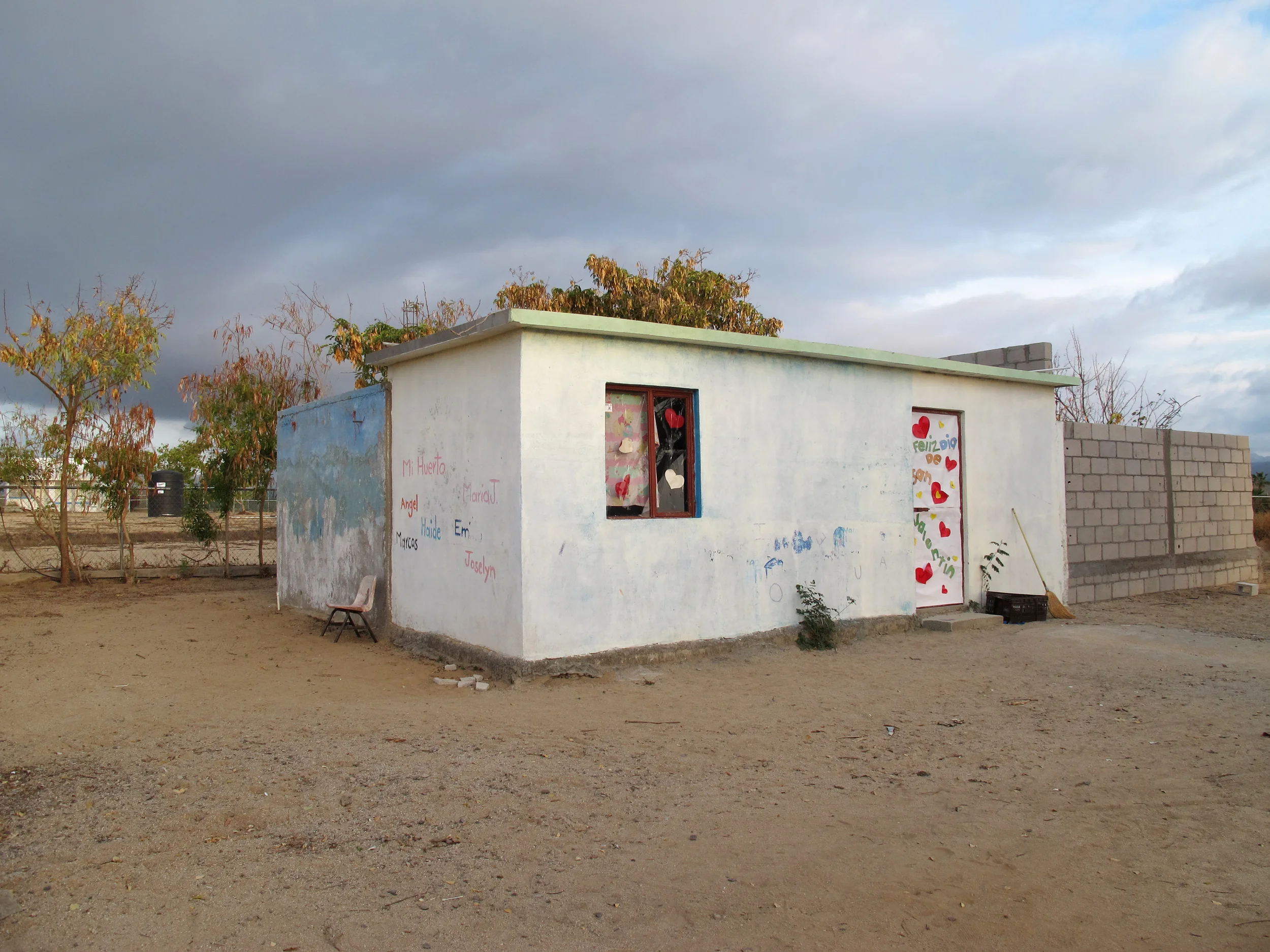 The school after the parents cleaned the front yard.